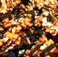 Order Chocolate Drizzled Popcorn Dark Caramel with Peanuts food online from Great American Popcorn Works store, Telford on bringmethat.com