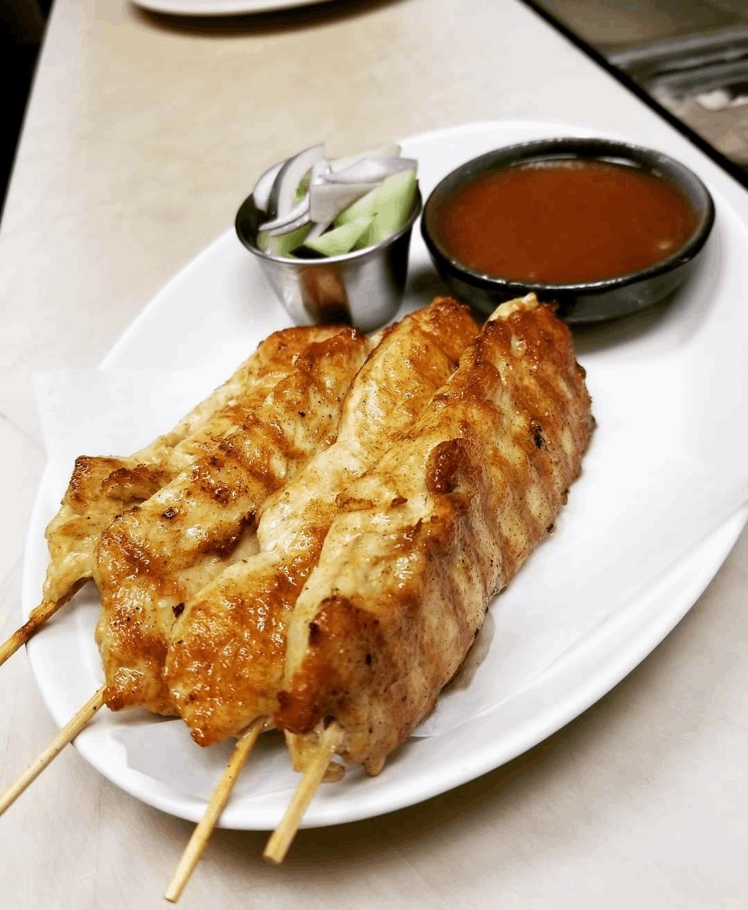 Order 4 Piece Chicken Satay food online from Penthai store, Mount Prospect on bringmethat.com