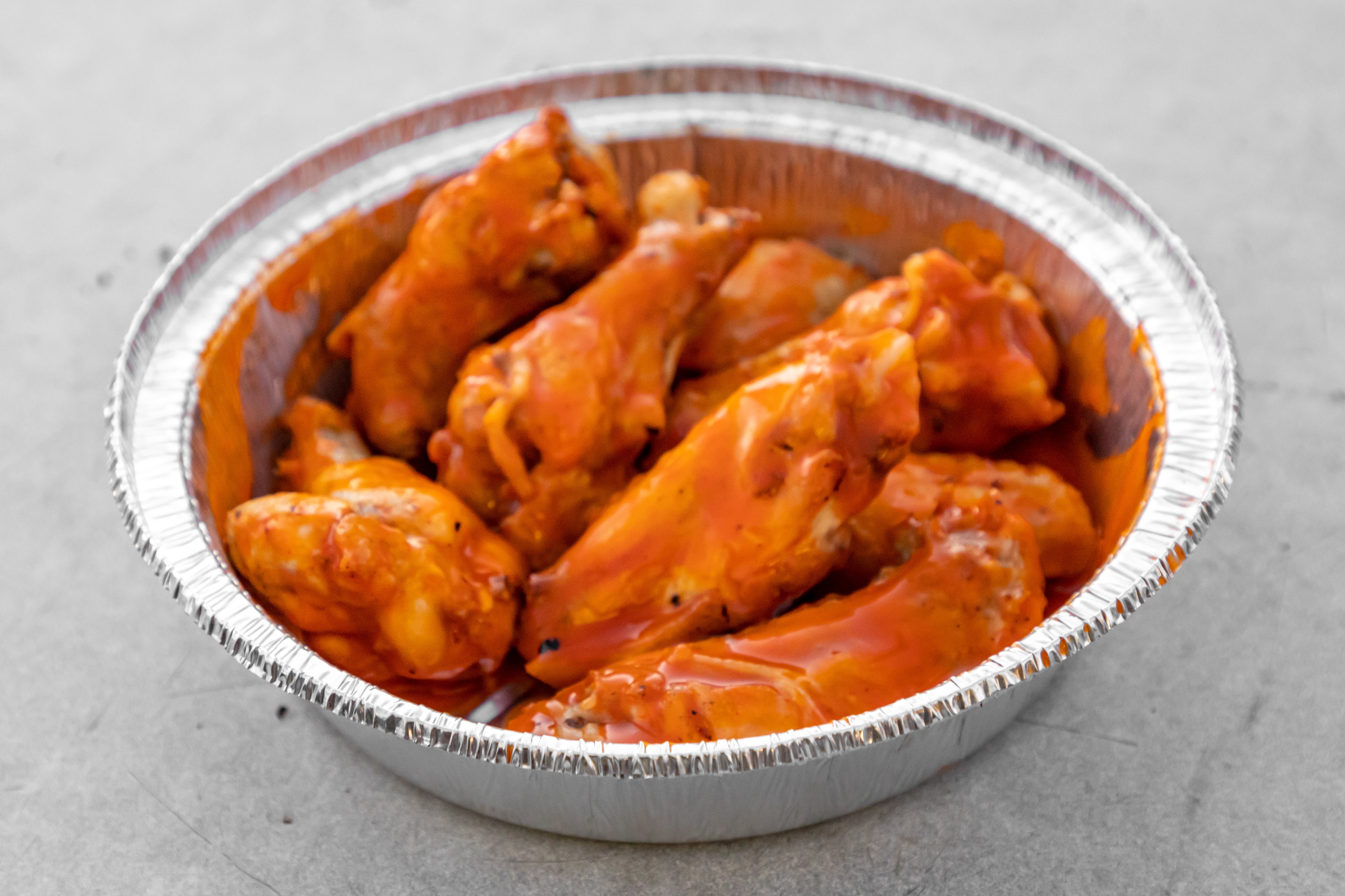 Order Buffalo Wings - 8 Pieces food online from Pizzamania store, Los Angeles on bringmethat.com