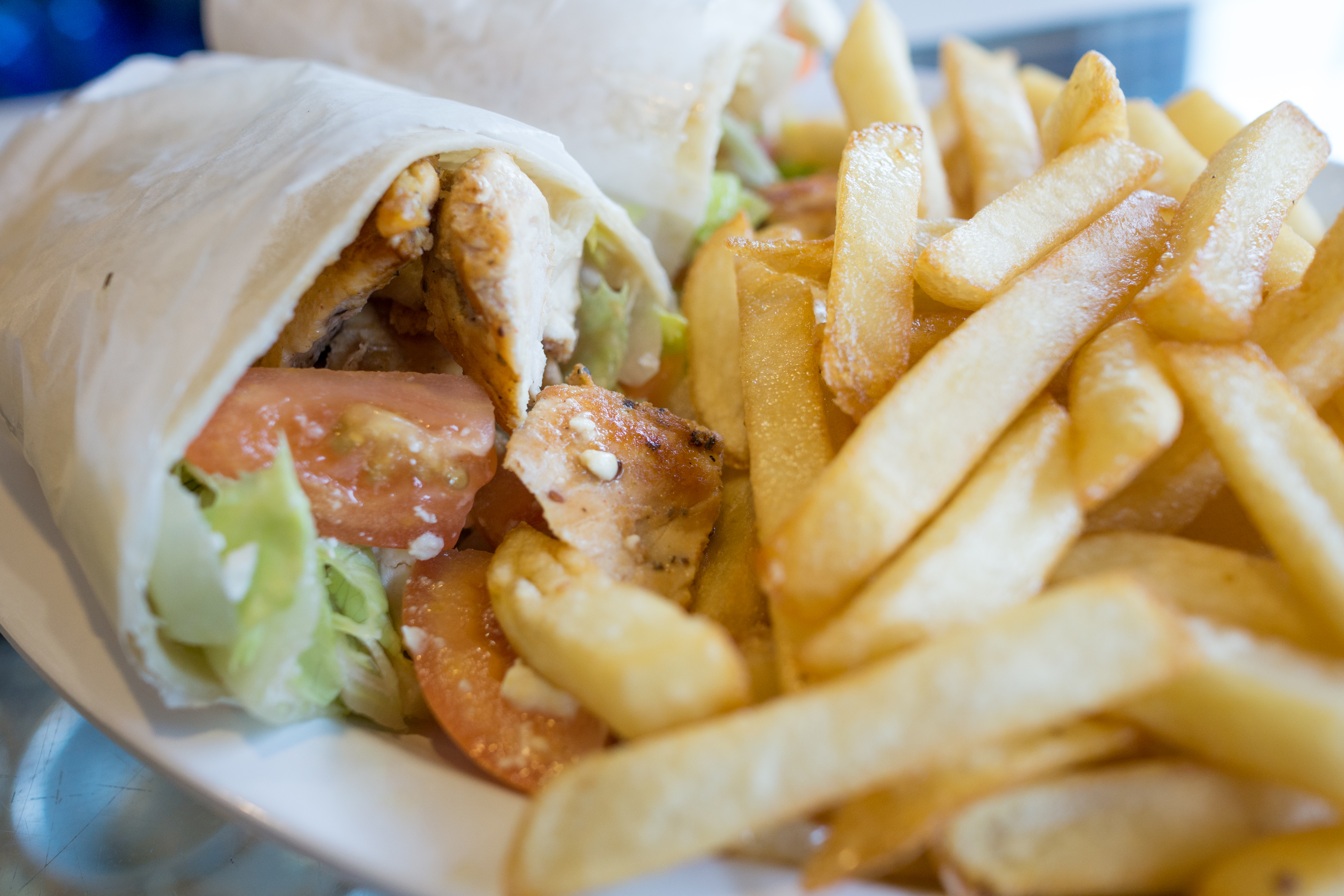 Order Grilled Chicken Caesar Wrap food online from Plaza King store, Brooklyn on bringmethat.com