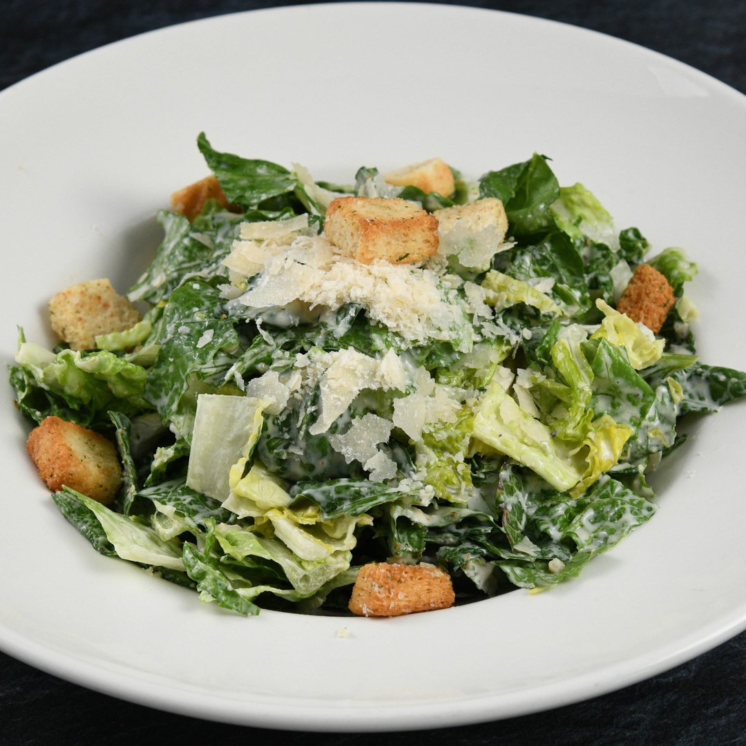 Order Big Islander Caesar Salad food online from Rainforest Cafe store, Las Vegas on bringmethat.com