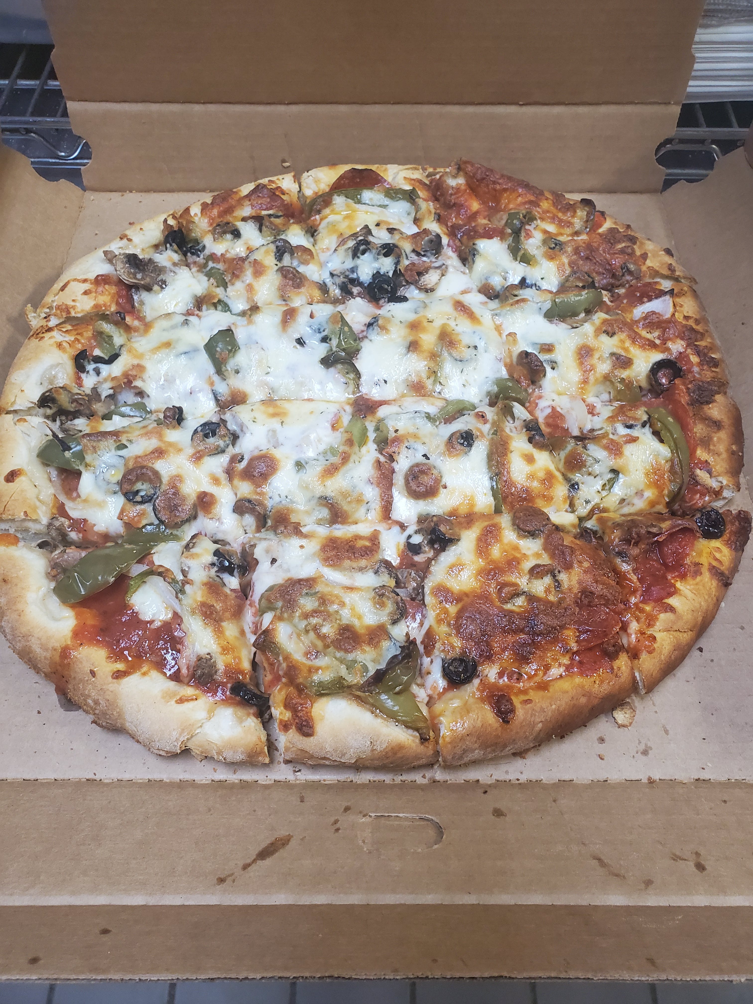 Order Cucina’s Colossal Pizza - Small 12'' food online from Pizza Cucina store, Oswego on bringmethat.com