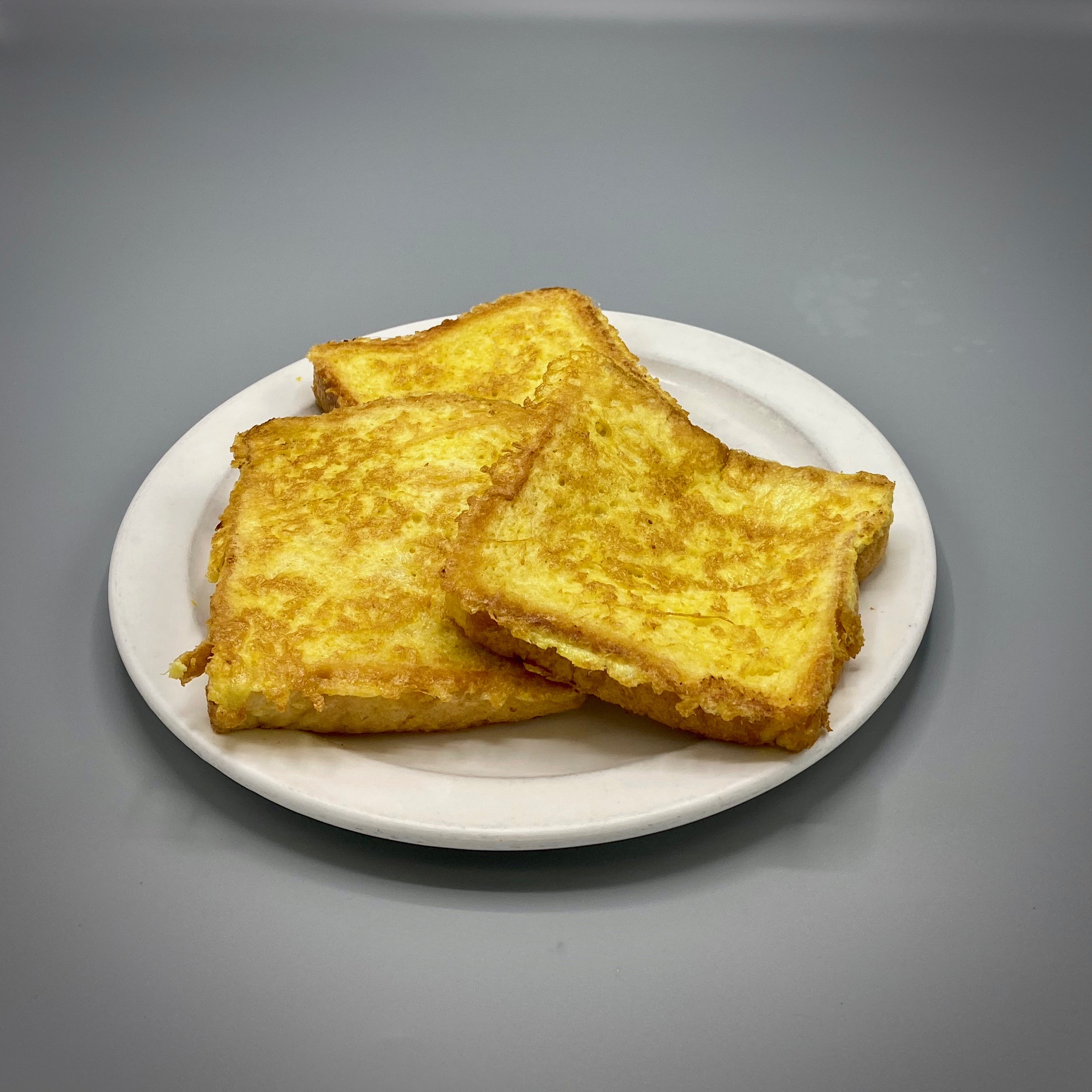 Order French Toast with Butter and Syrup (3)  food online from Terry's Diner store, Moosic on bringmethat.com