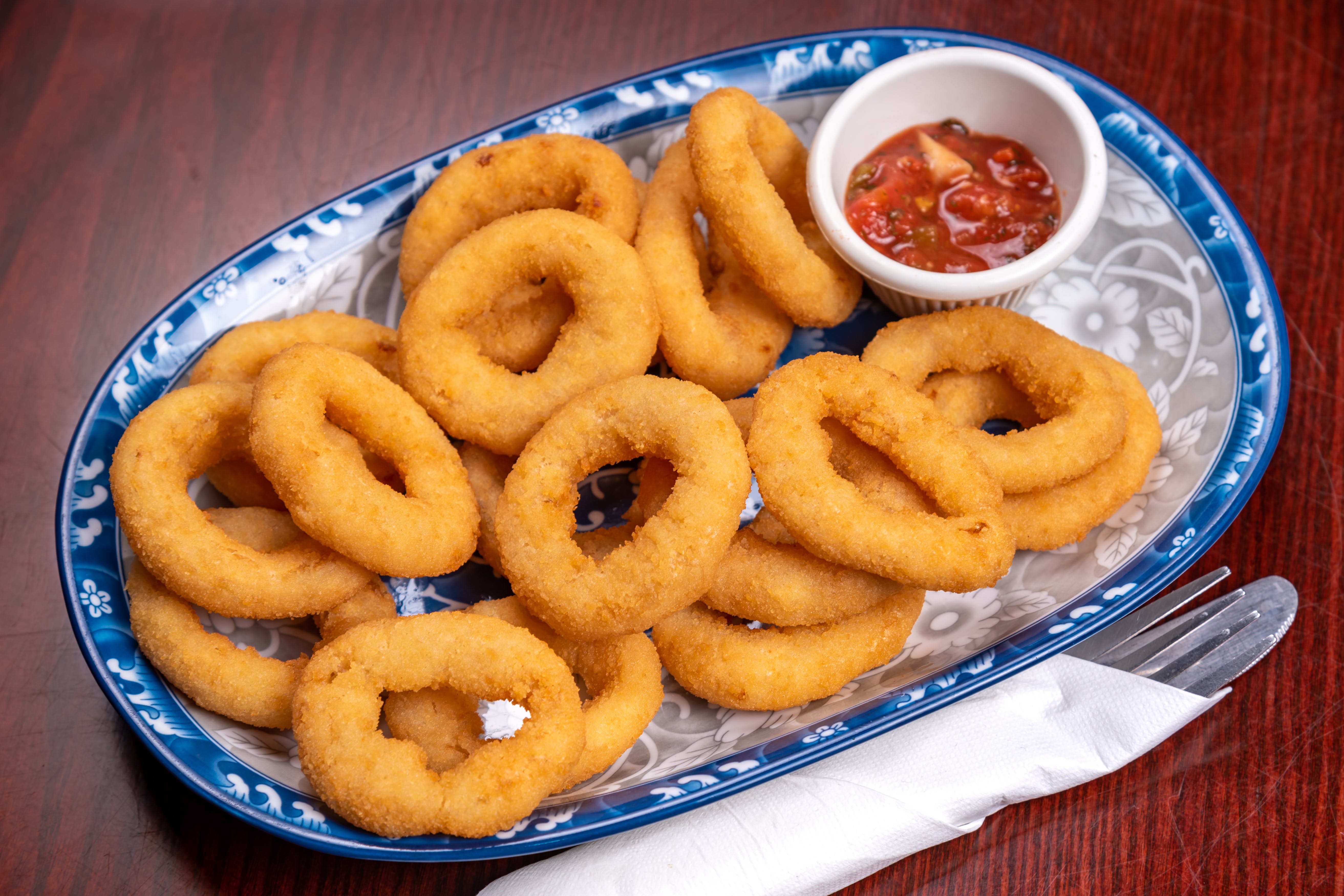 Order Onion Rings - Side food online from Pronto Deli & Pizza store, Queens on bringmethat.com