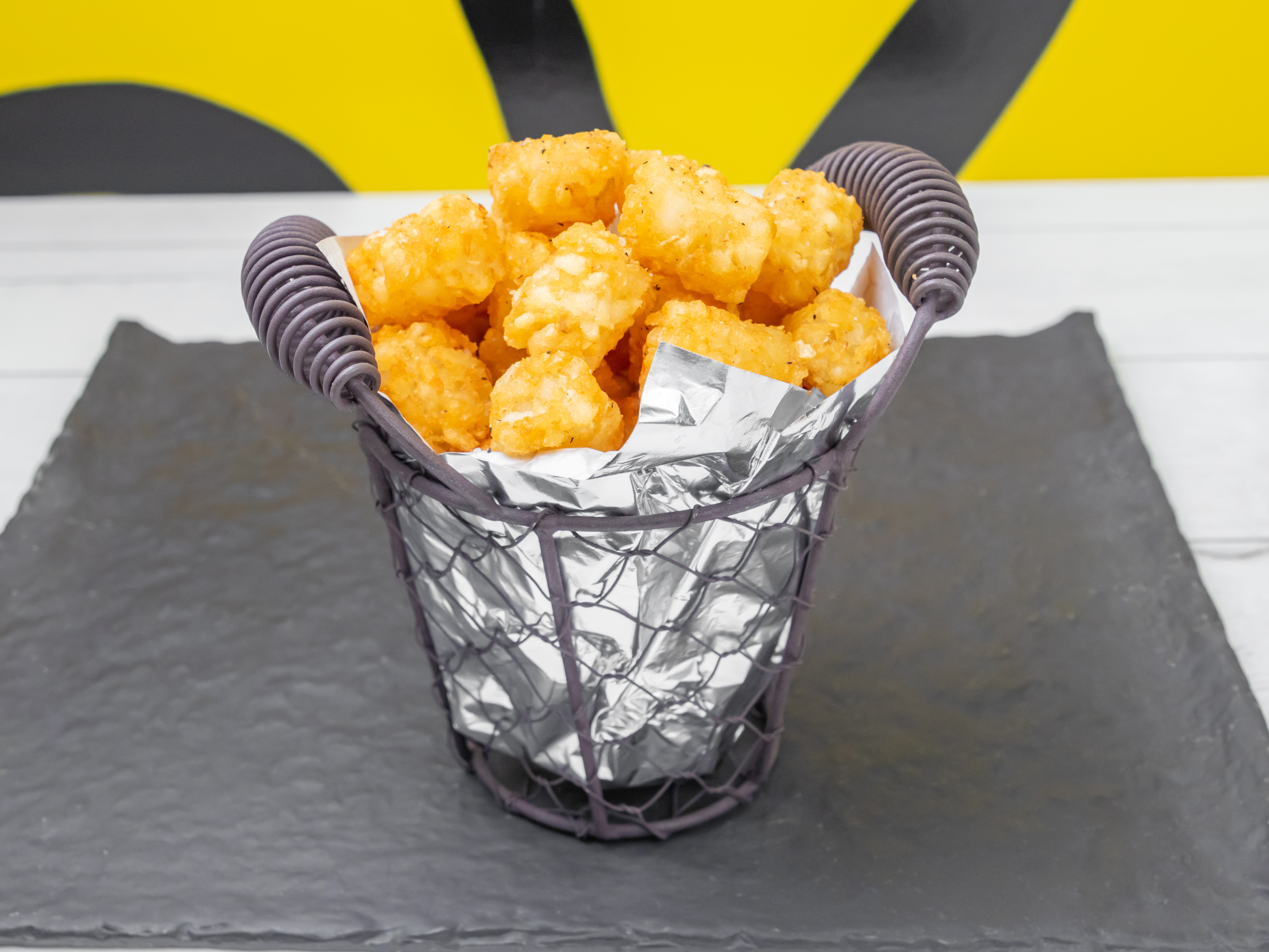 Order Regular and Super Melty Cheesy Tots food online from Bud Burger & Steak store, Suwanee on bringmethat.com