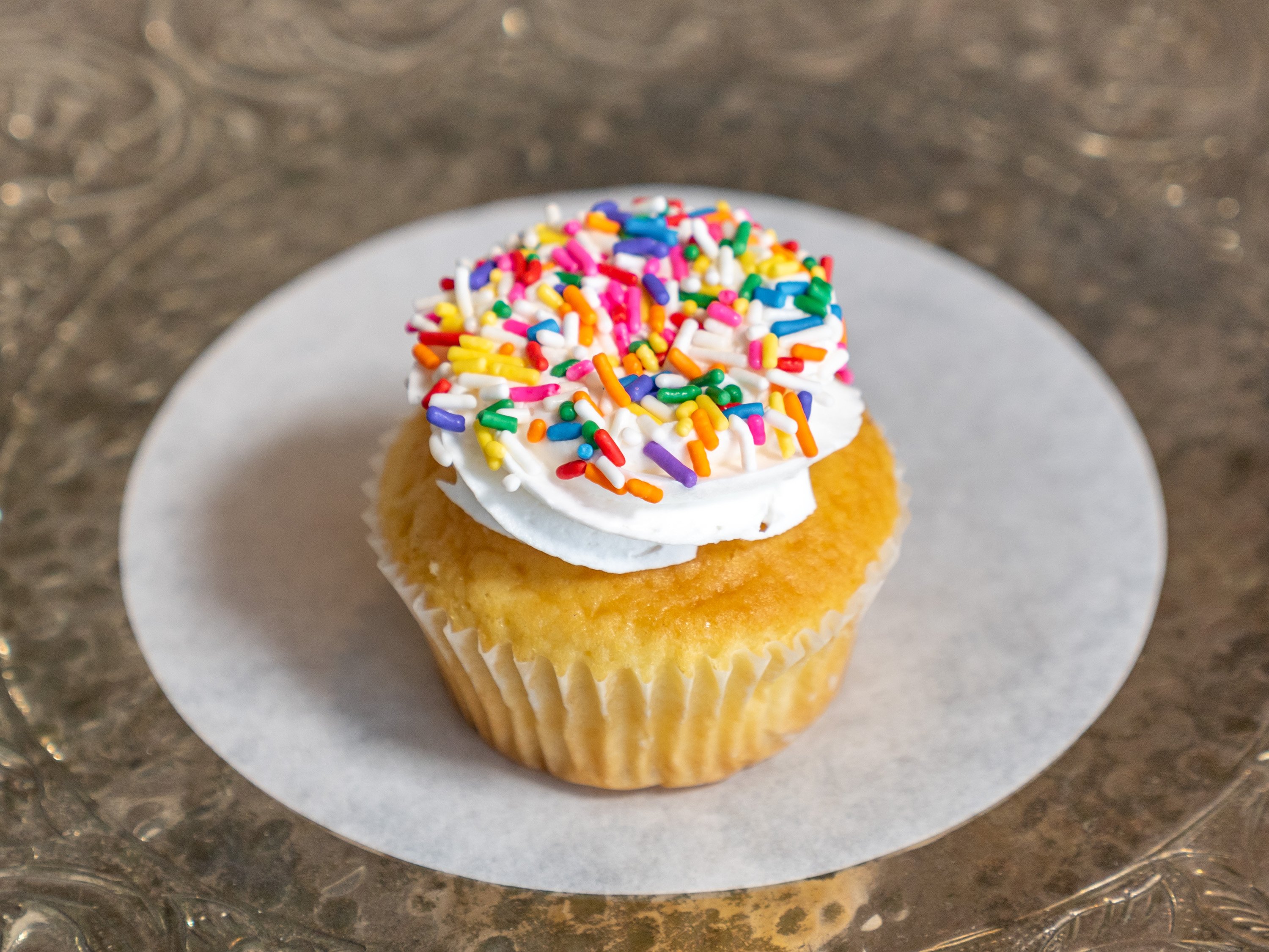 Order Vanilla Swirl Cupcake food online from Frosted Flour store, Lodi on bringmethat.com