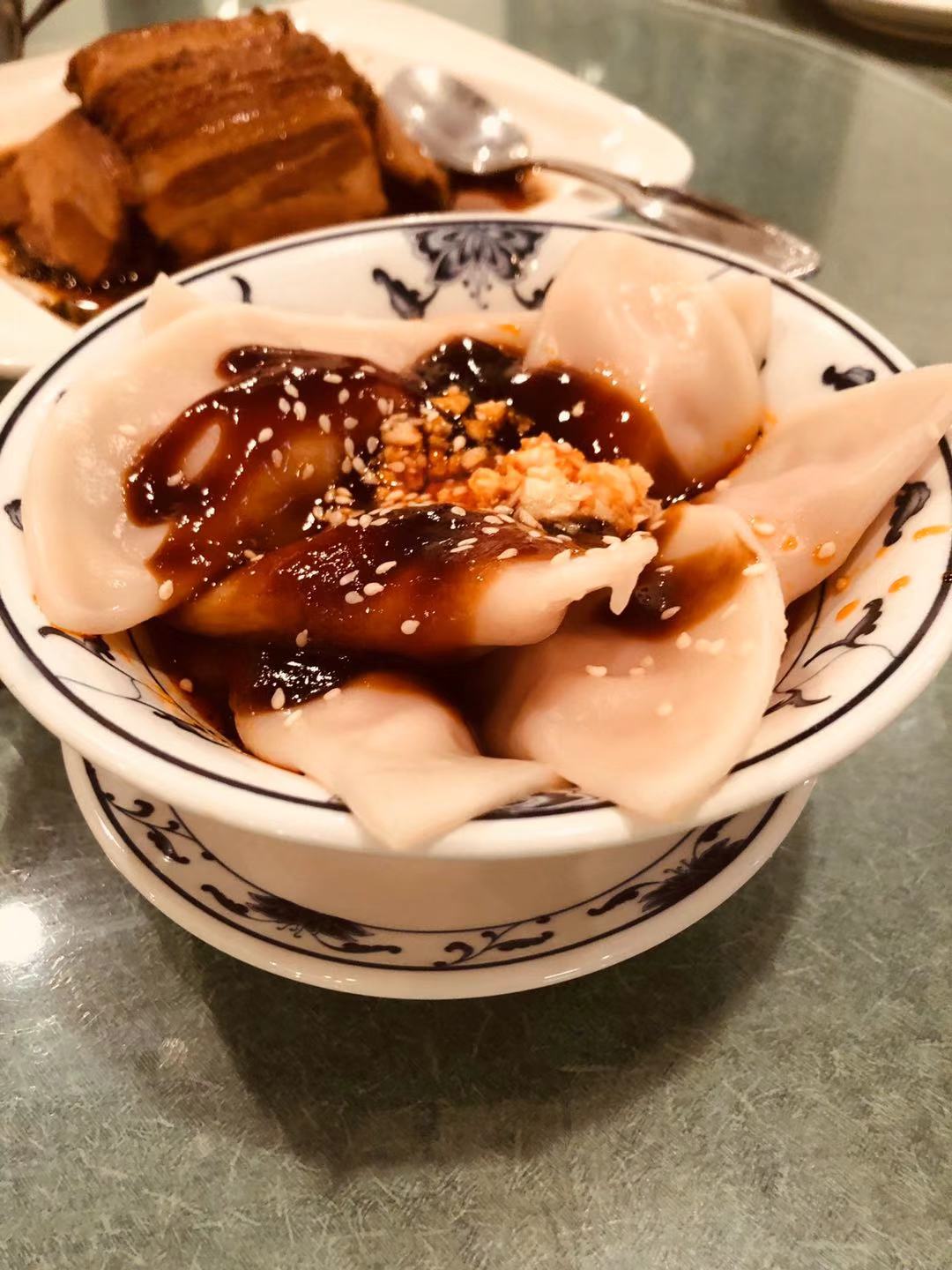 Order A9. Sichuan Dumplings with Chili Oil food online from House of Sun Chinese Restaurant store, Cincinnati on bringmethat.com