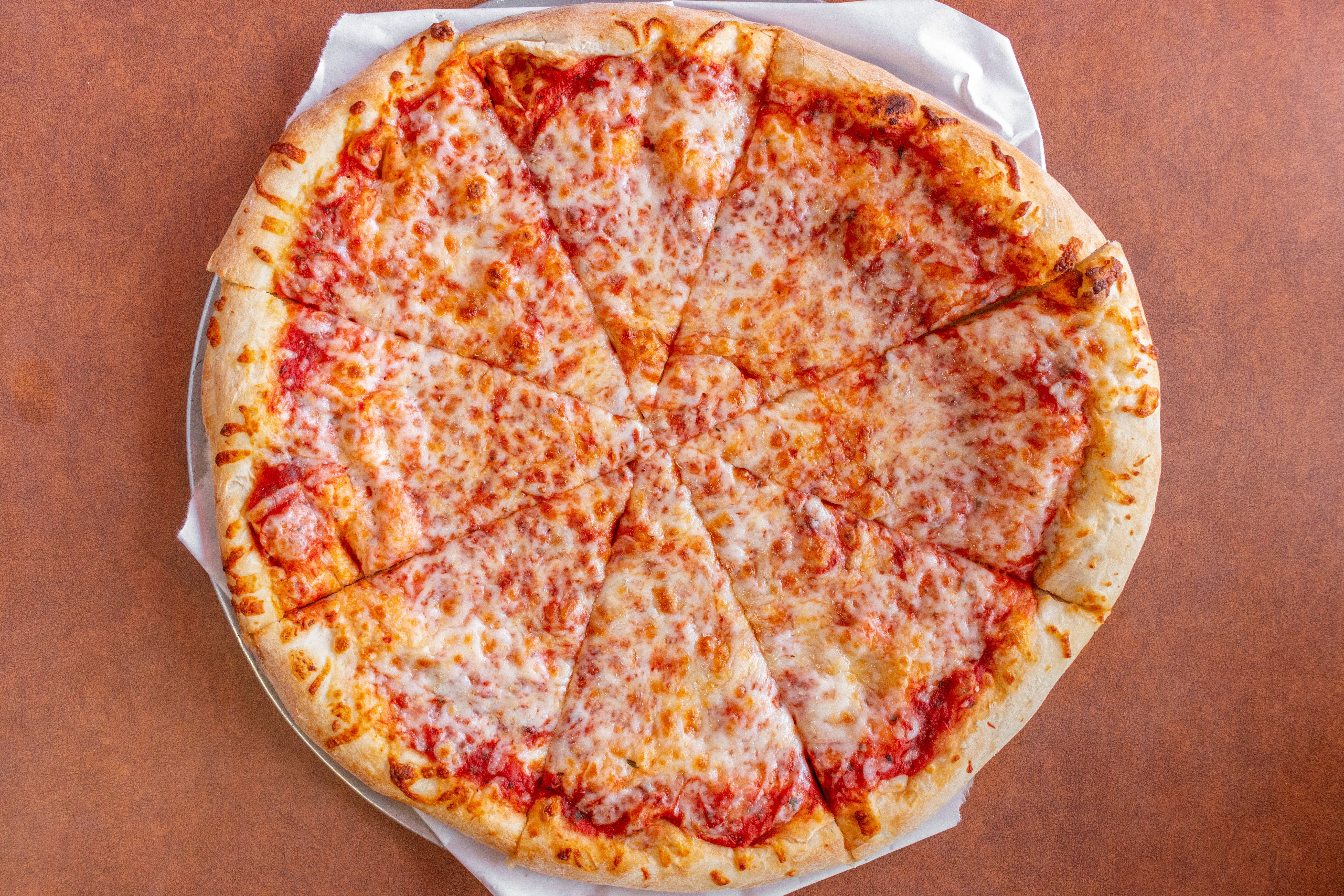 Order Cheese Pizza - 12'' (8 Slices) food online from Famous Pizza store, Denver on bringmethat.com