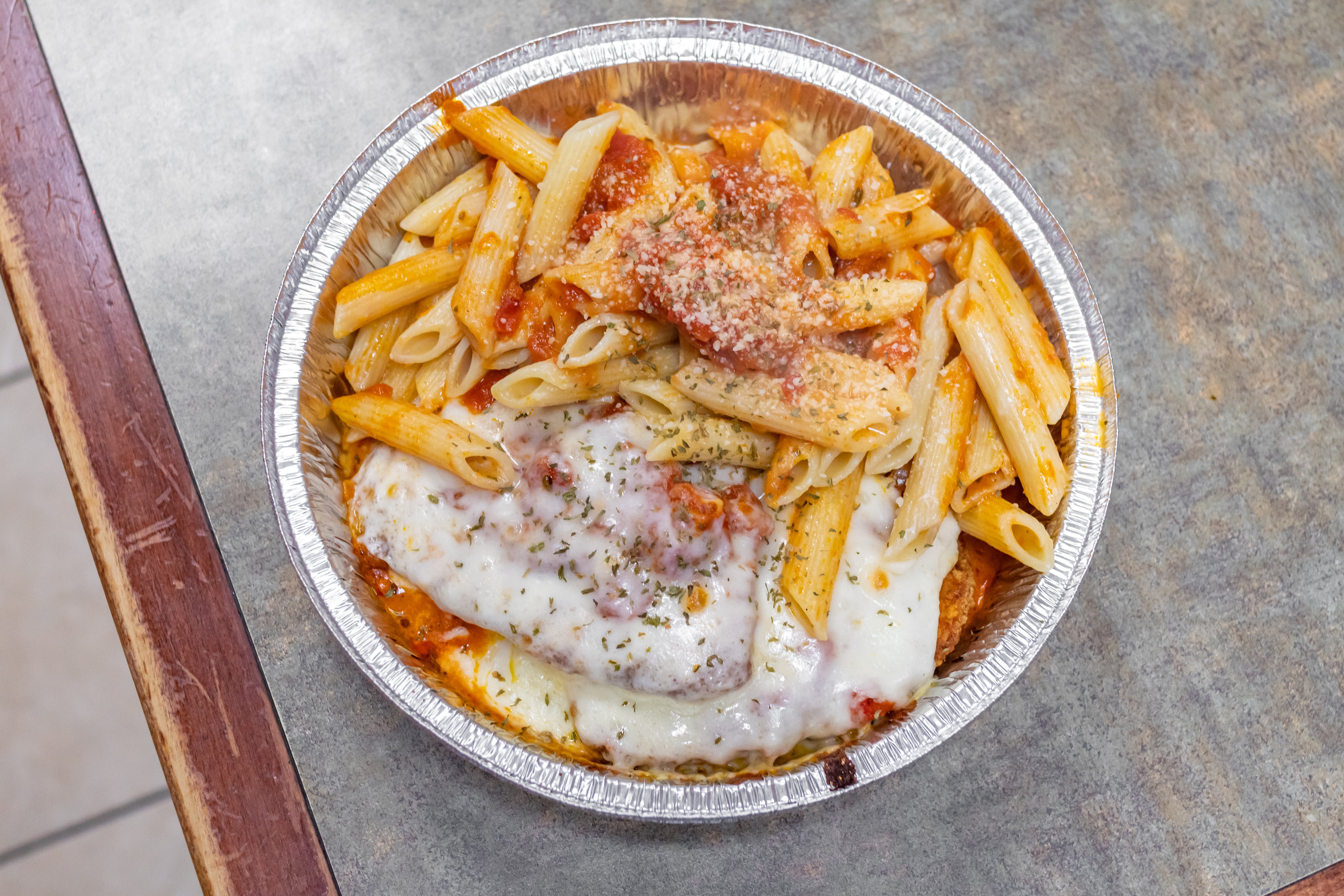 Order Chicken Parmesan - Entree food online from North End Pizza store, Oviedo on bringmethat.com