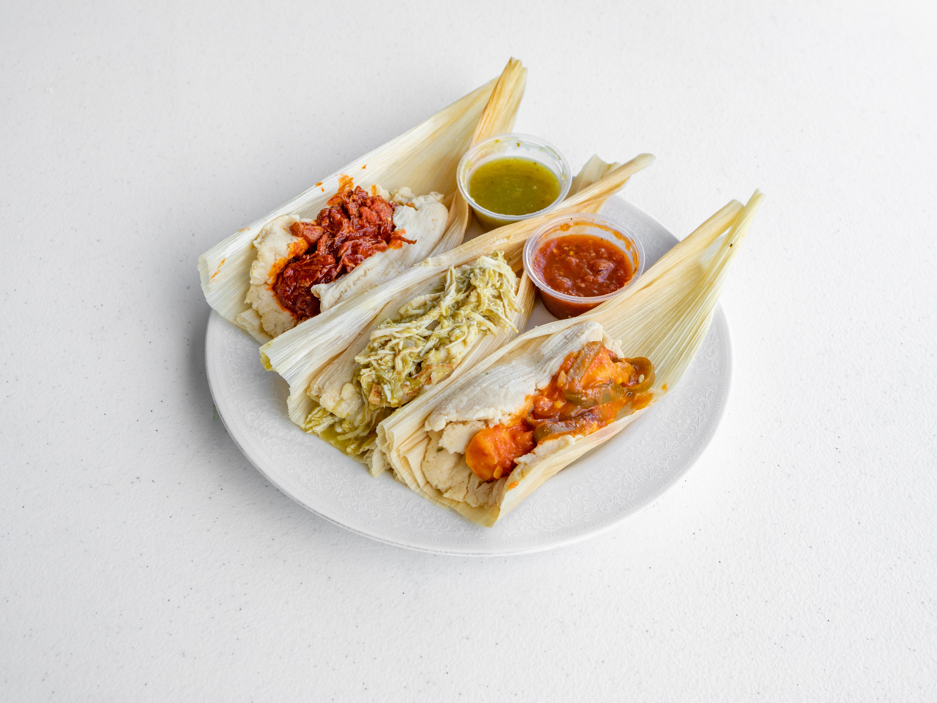Order Tamales (Please Specify the kind of tamales) food online from La Mexicana Market store, Round Rock on bringmethat.com