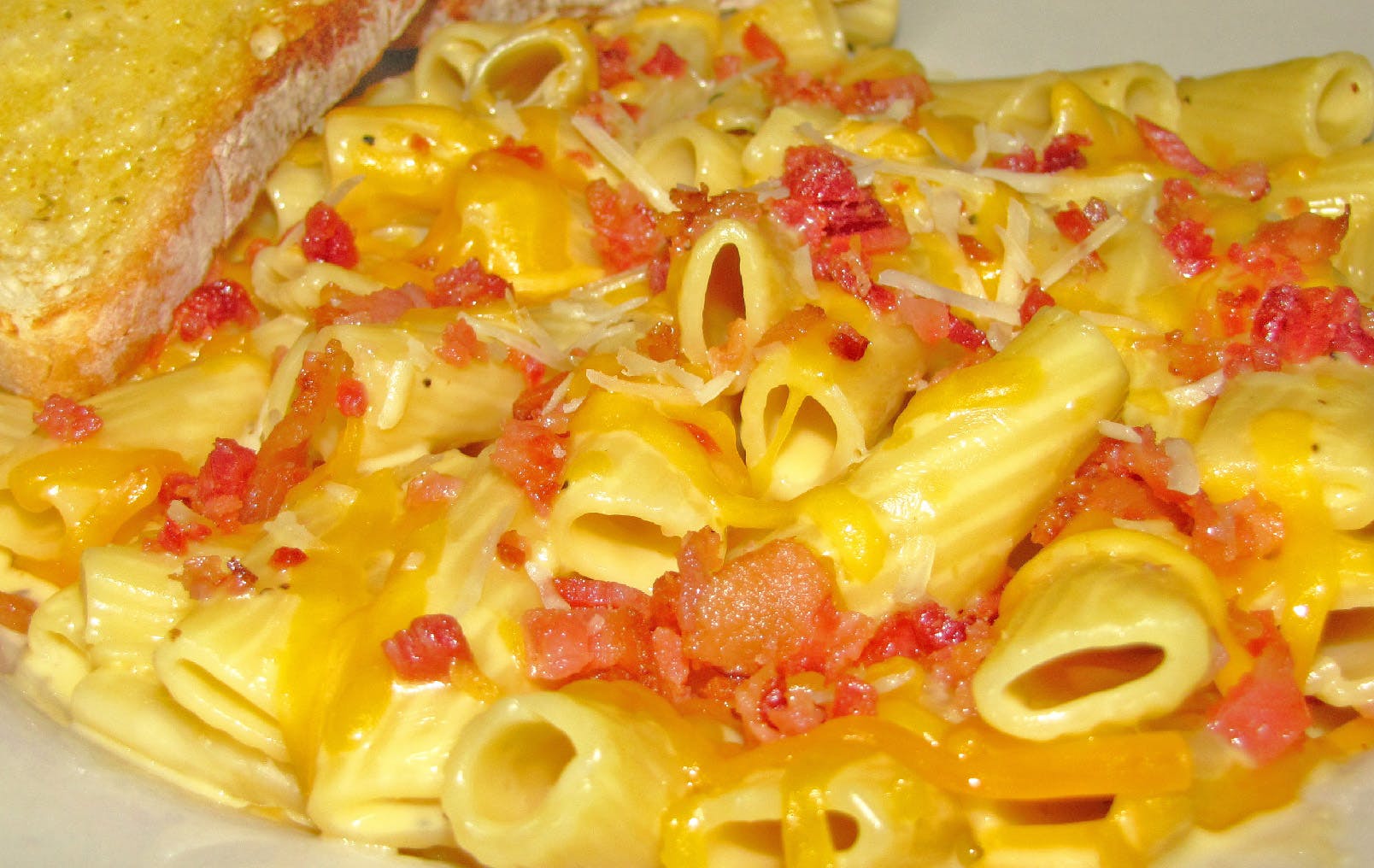 Order Three Cheese Bacon Caballero - Entree food online from Sammy Pizza & Restaurant store, Elk River on bringmethat.com