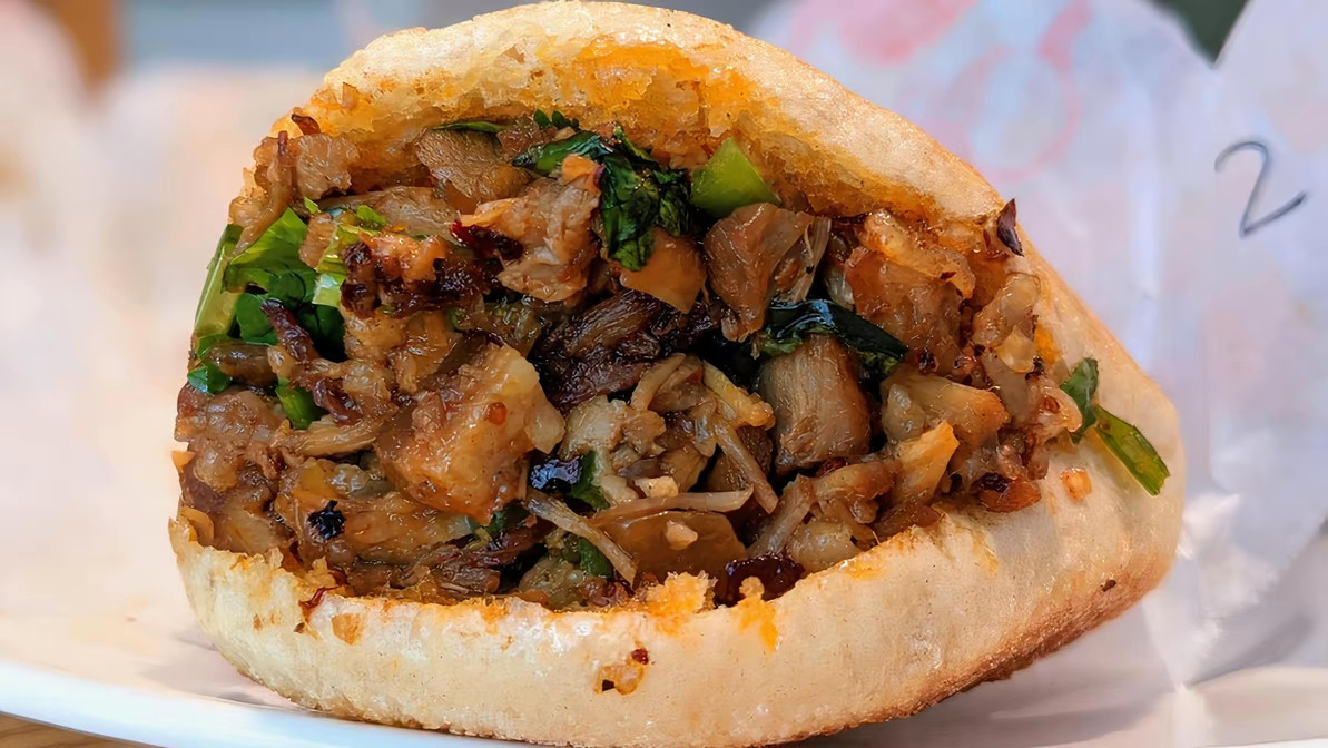 Order Spicy Pork Burger 辣猪馍 food online from Sister Liu's Kitchen store, Durham on bringmethat.com