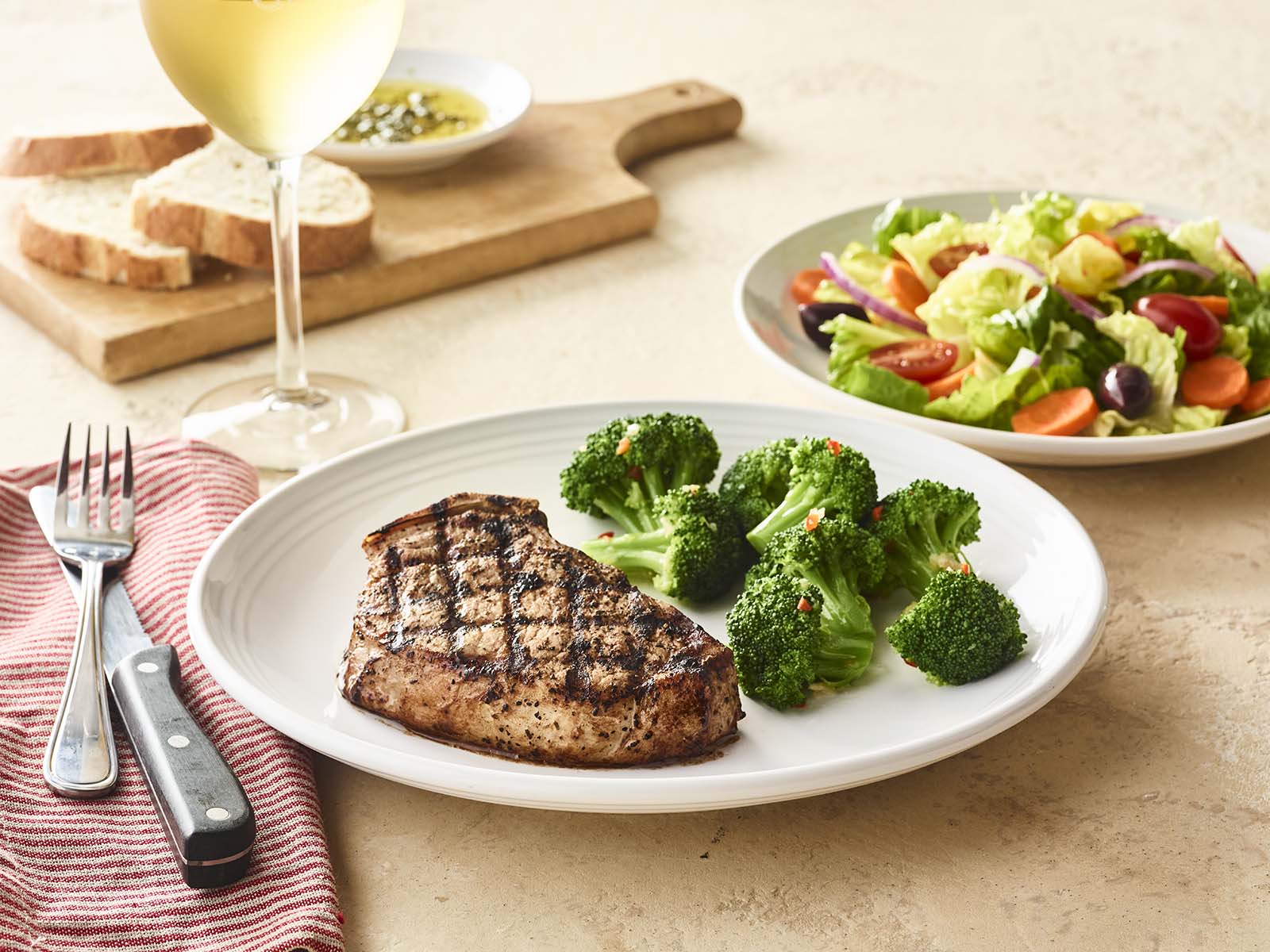 Order Tuscan-Grilled Pork Chop* food online from Carrabba's Italian Grill store, Scottsdale on bringmethat.com