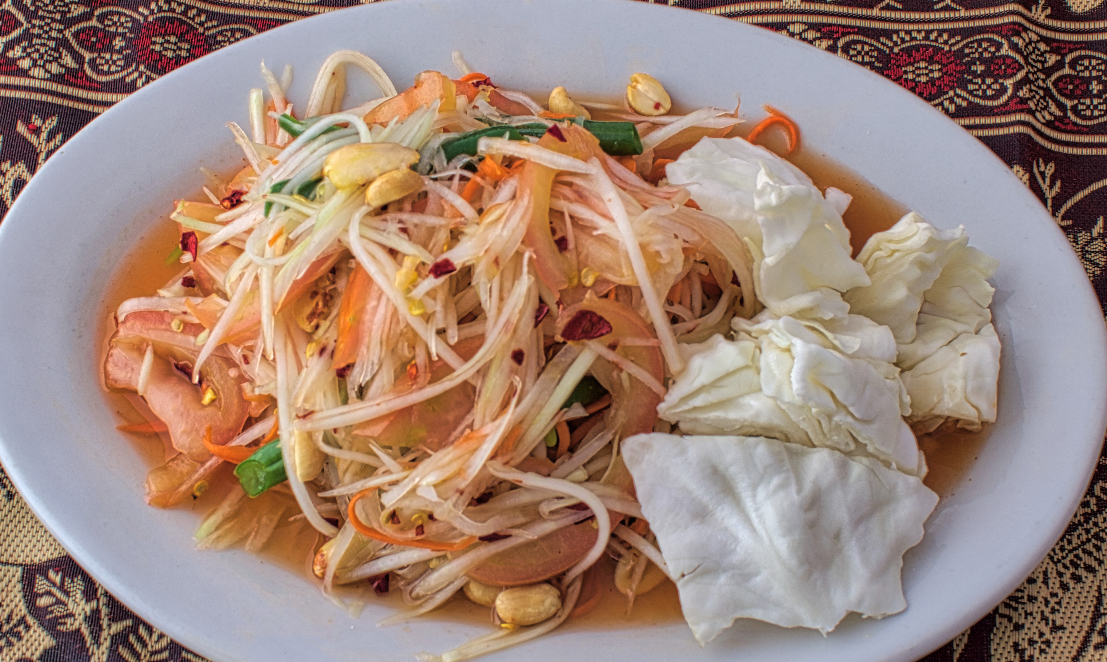 Order Som Tum food online from Sweet Basil Thai Cuisine store, Hurst on bringmethat.com