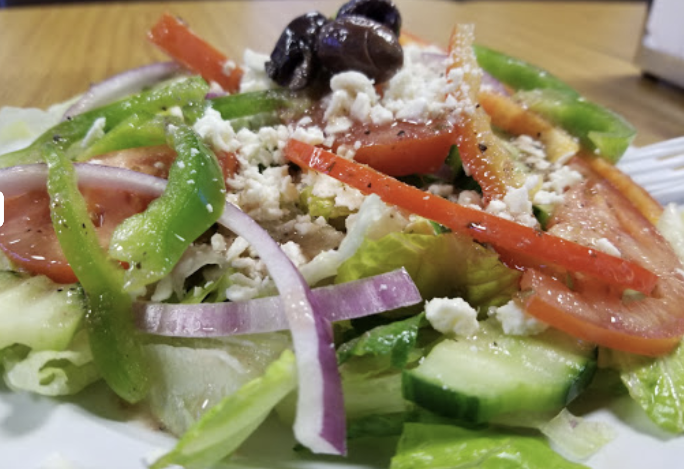 Order Greek Salad food online from Greek's Grill The store, Chandler on bringmethat.com