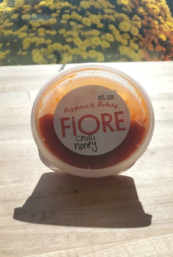 Order FiORE Chilli Honey food online from Fiore Pizzeria + Bakery store, Forest Park on bringmethat.com