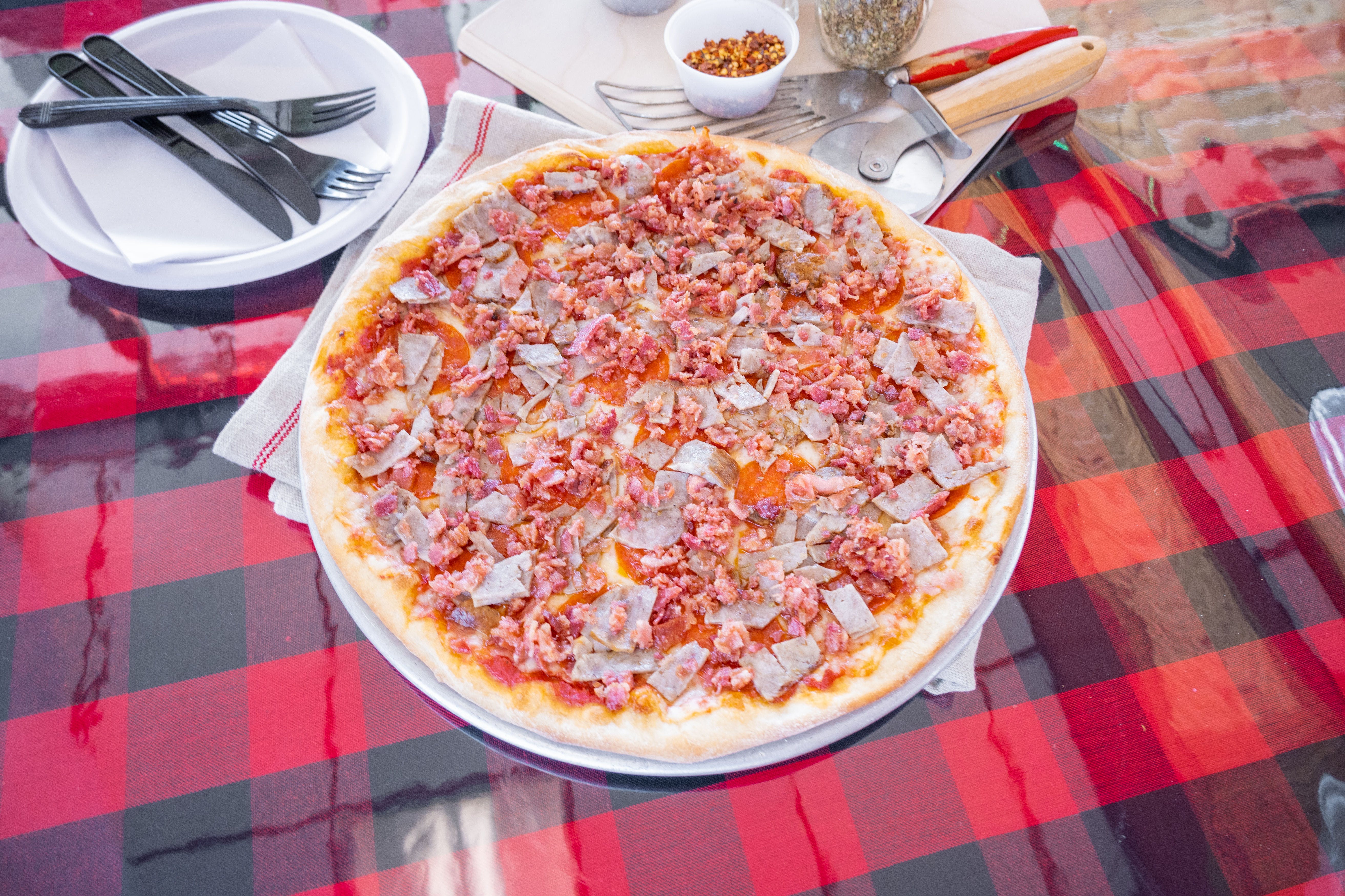 Order Meat Lovers Pizza - Pizza food online from Maggio's Pizza & Pasta store, Woodbury on bringmethat.com