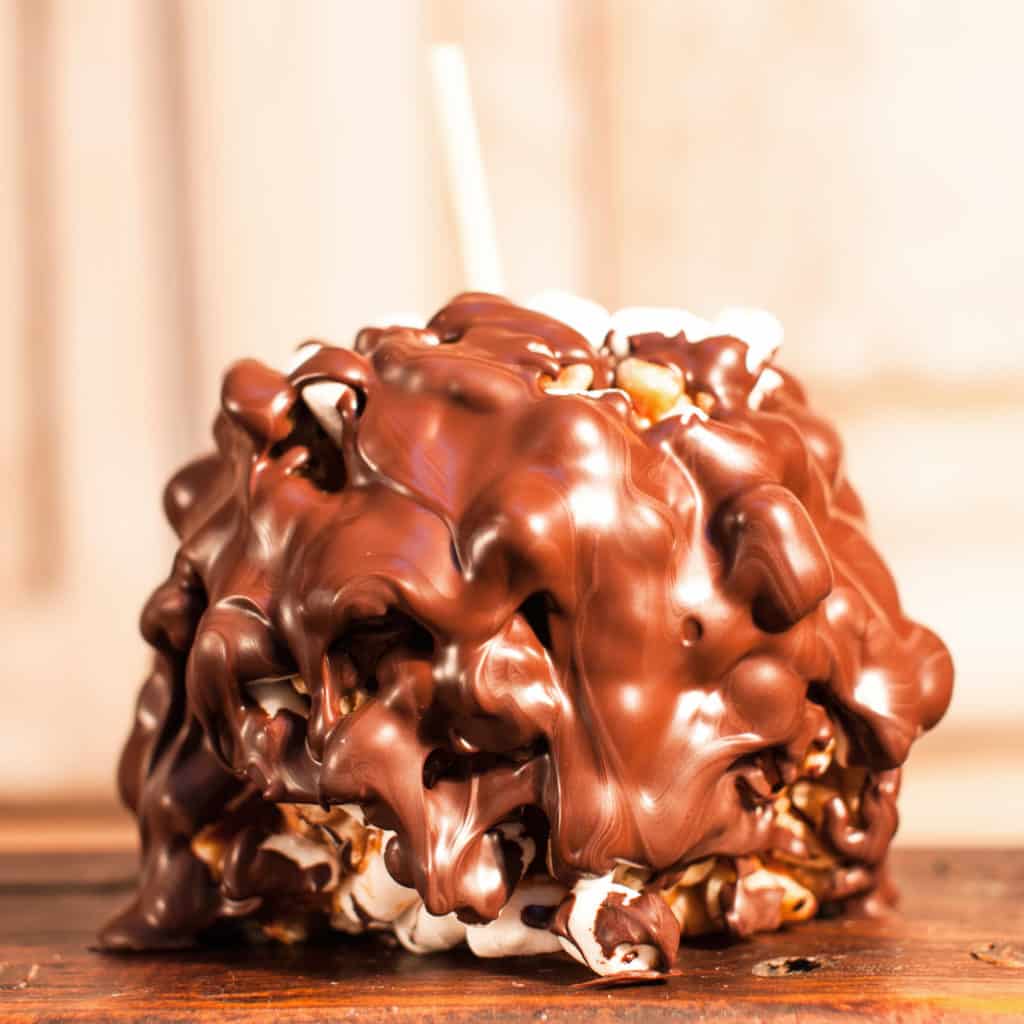 Order Dark Chocolate Rocky Road Caramel Apple food online from Candy Apple Shoppe store, Glenwood on bringmethat.com