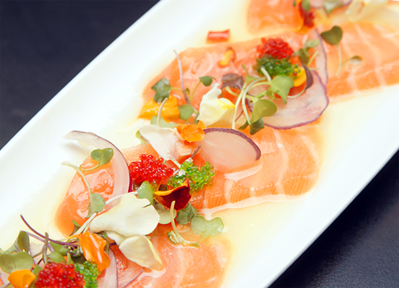Order Salmon  carpaccio food online from Ise Sushi Japanese Restaurant store, Placentia on bringmethat.com