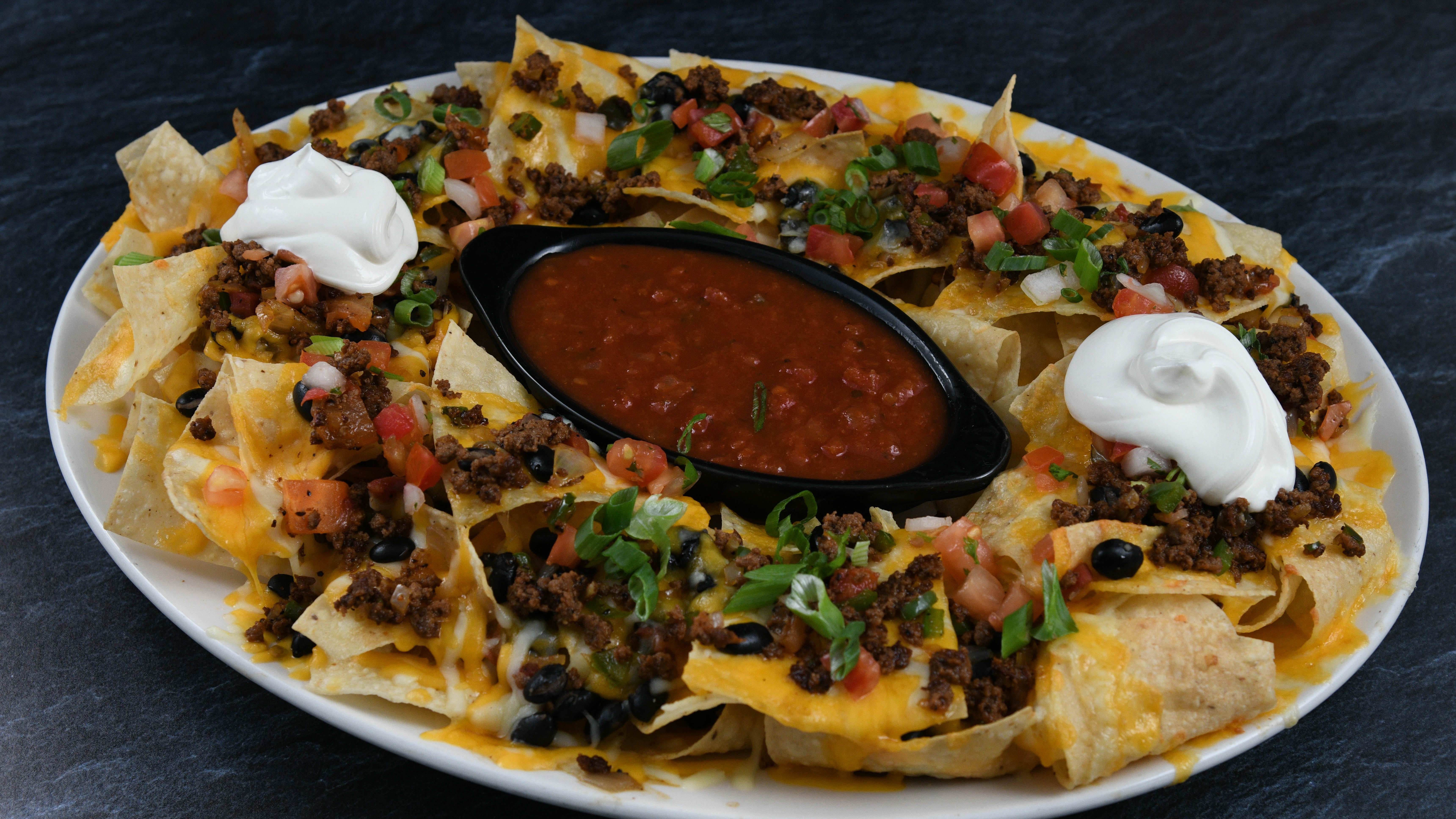 Order Beef Lava Nachos food online from Rainforest Cafe store, Atlantic City on bringmethat.com
