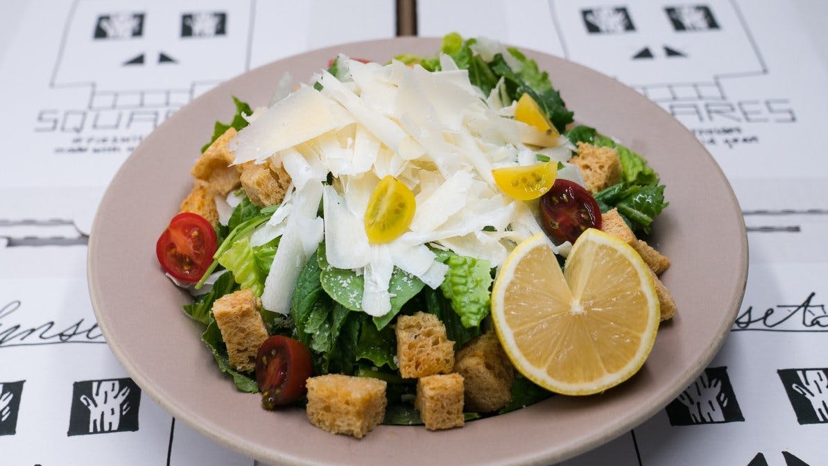 Order Caesar Salad - Salad food online from Sunset Squares Slice Shop store, San Francisco on bringmethat.com