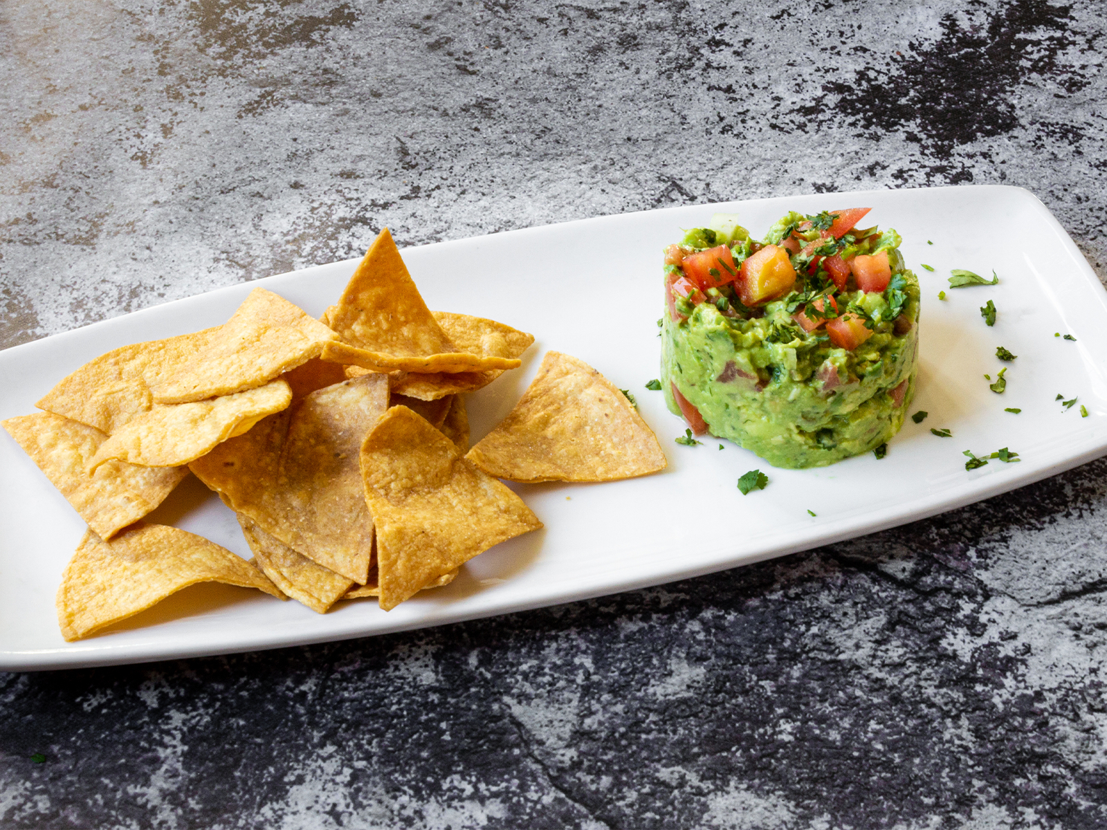 Order Classic Guacamole  food online from Antigua Latin Inspired Kitchen store, Milwaukee on bringmethat.com