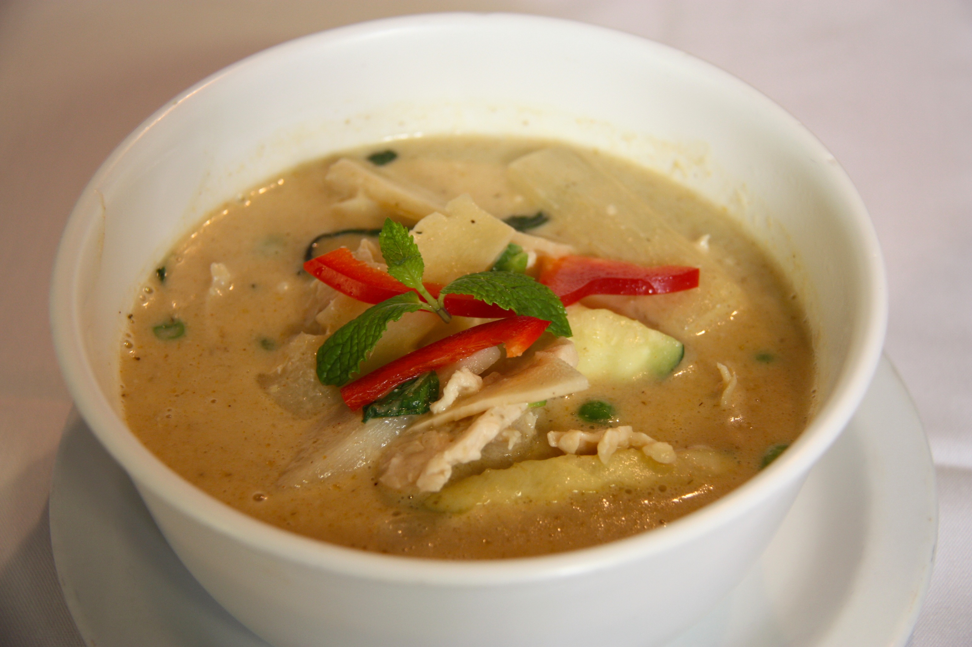 Order Green Curry food online from Ploy Ii-Thai Cuisine store, San Francisco on bringmethat.com