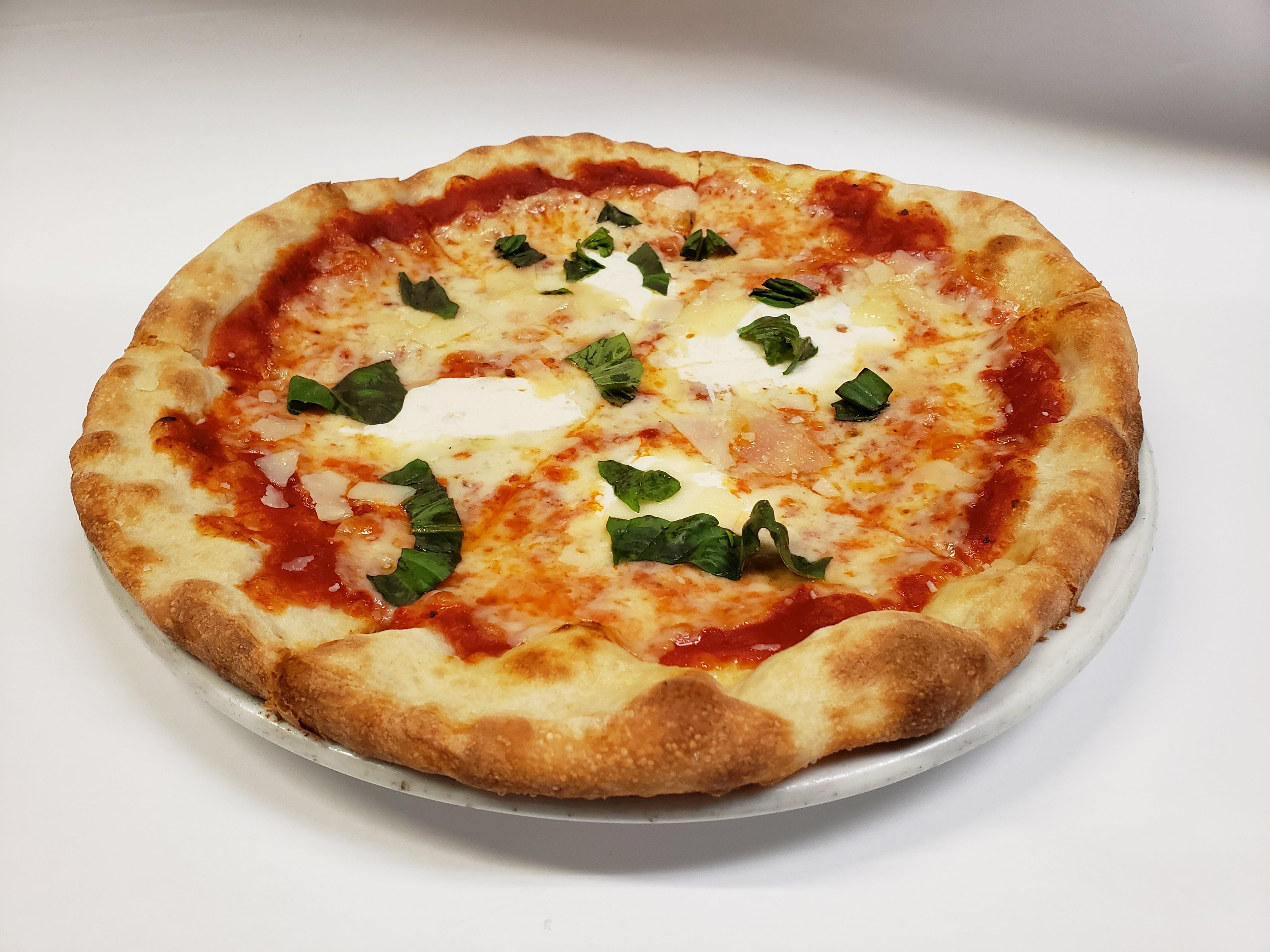 Order Pizza Margherita - Individual food online from Joe G Restaurant store, New York on bringmethat.com