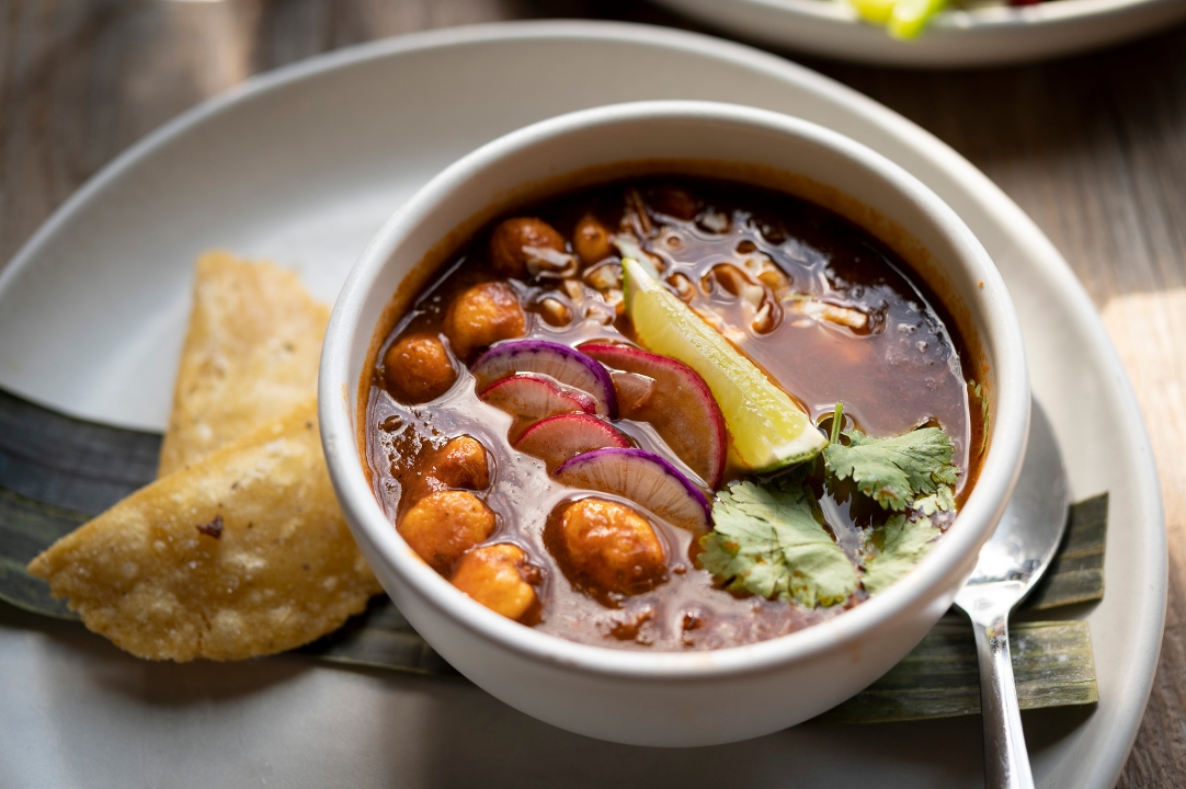 Order Bowl of Pozole Rojo food online from Cactus Restaurant store, Seattle on bringmethat.com
