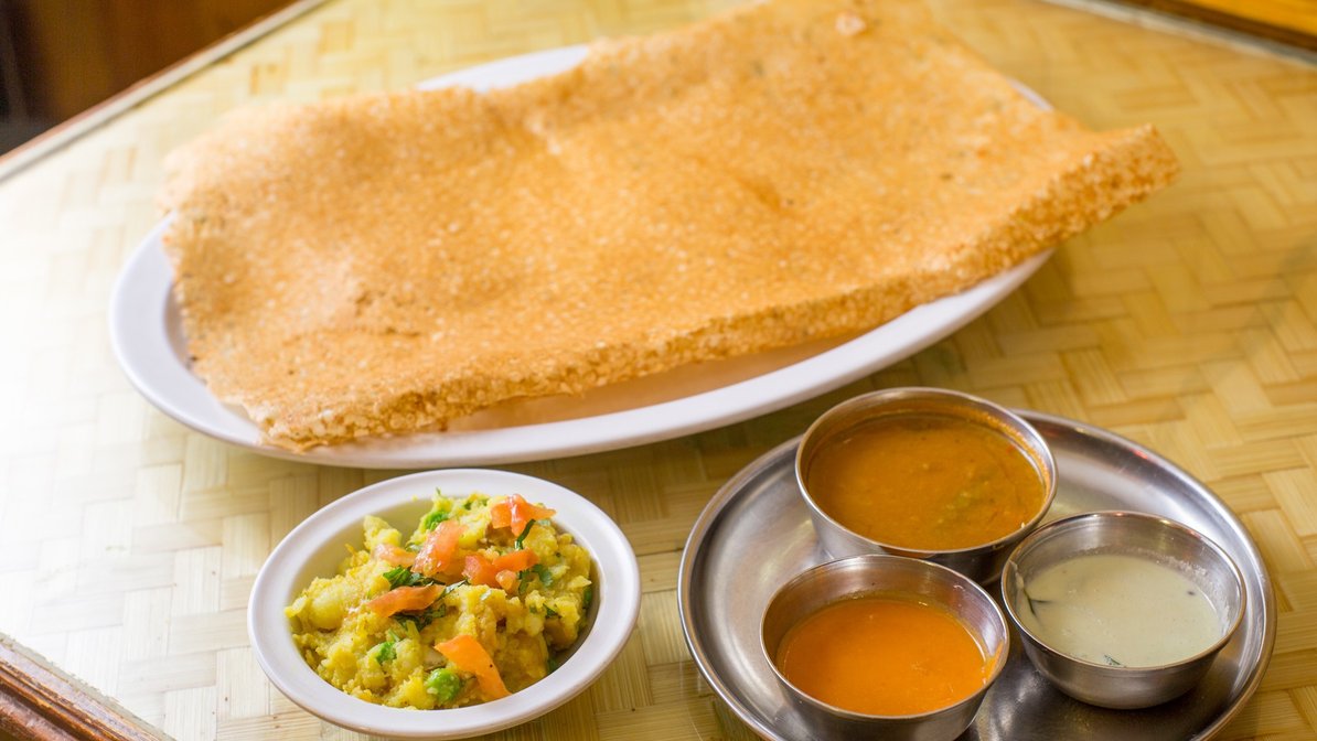 Order Rava Masala Dosa food online from Samudra Restaurant store, Jackson Heights on bringmethat.com