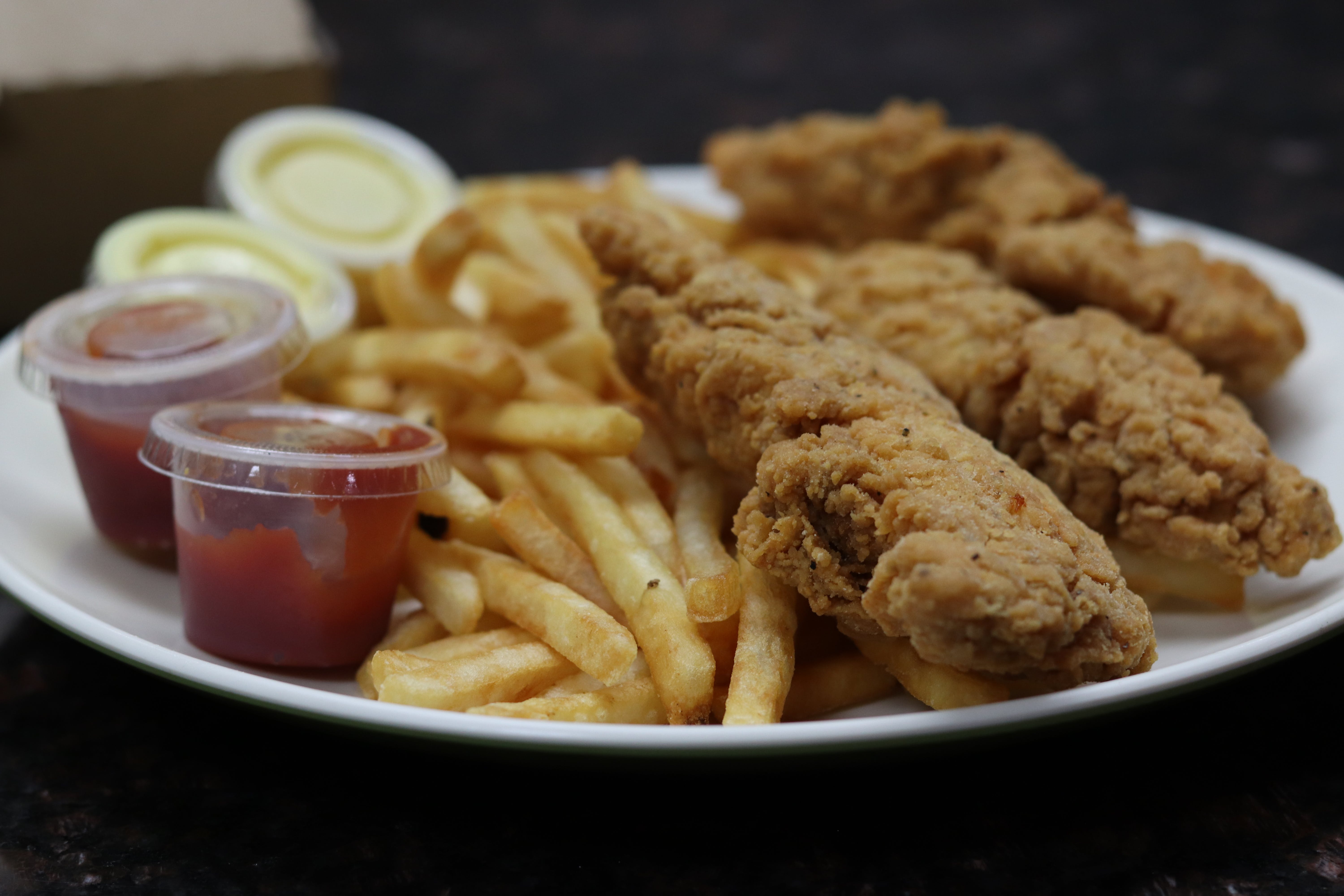 Order Kid's Chicken Tenders - 3 Pieces food online from The Village Grille store, Great Falls on bringmethat.com