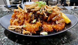 Order Spicy Crispy Orange Chicken food online from Aki Sushi & Japanese Fusion store, San Jacinto on bringmethat.com