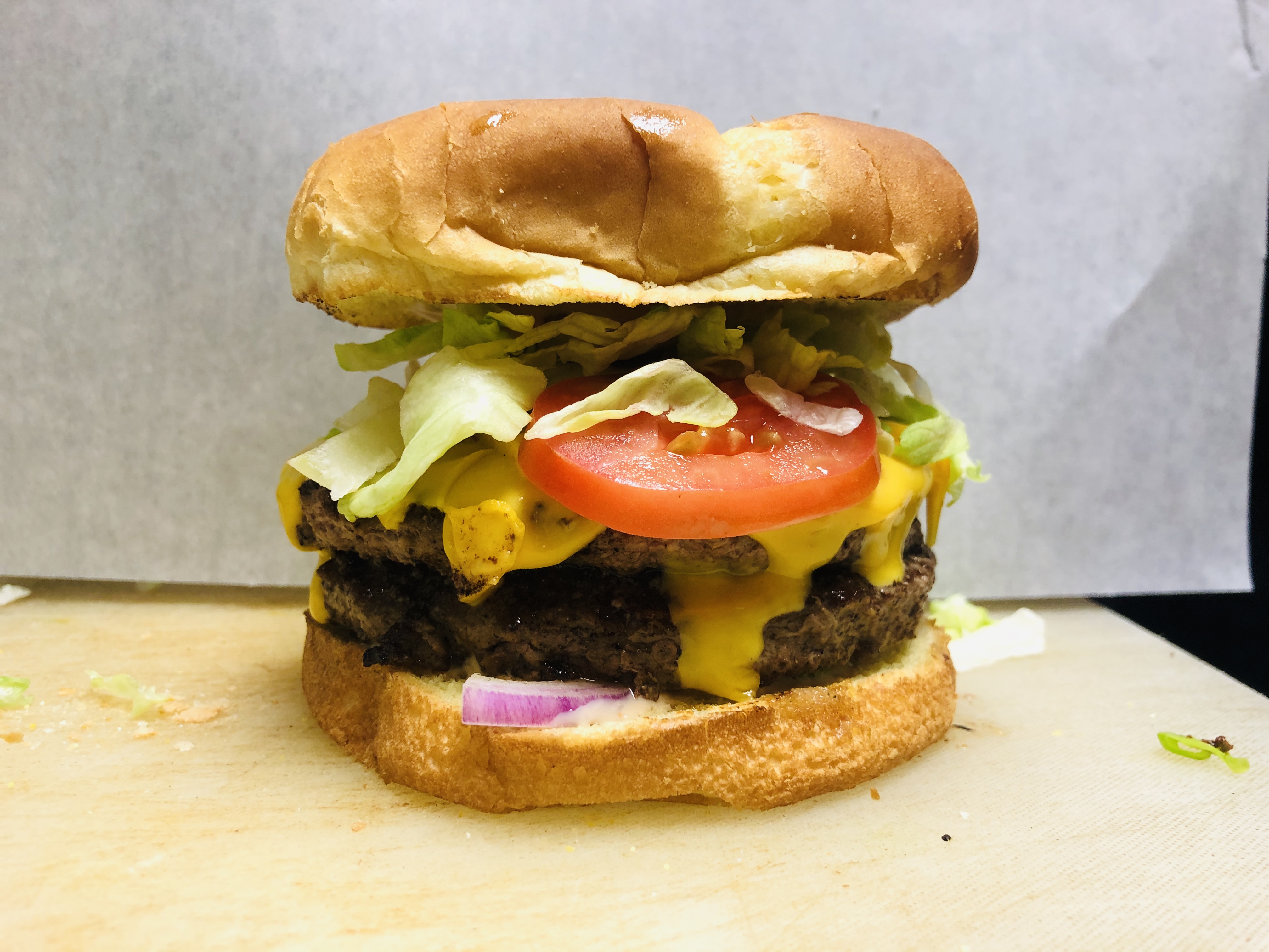 Order Double Omni Burger food online from Omni Deli store, Ontario on bringmethat.com