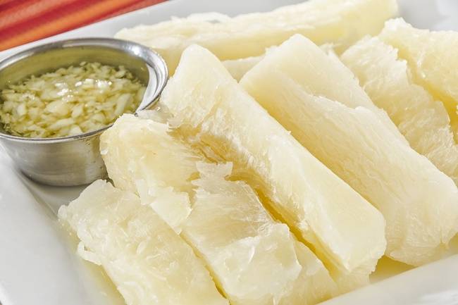Order Yuca con Mojo food online from Papi Cuban store, Kennesaw on bringmethat.com