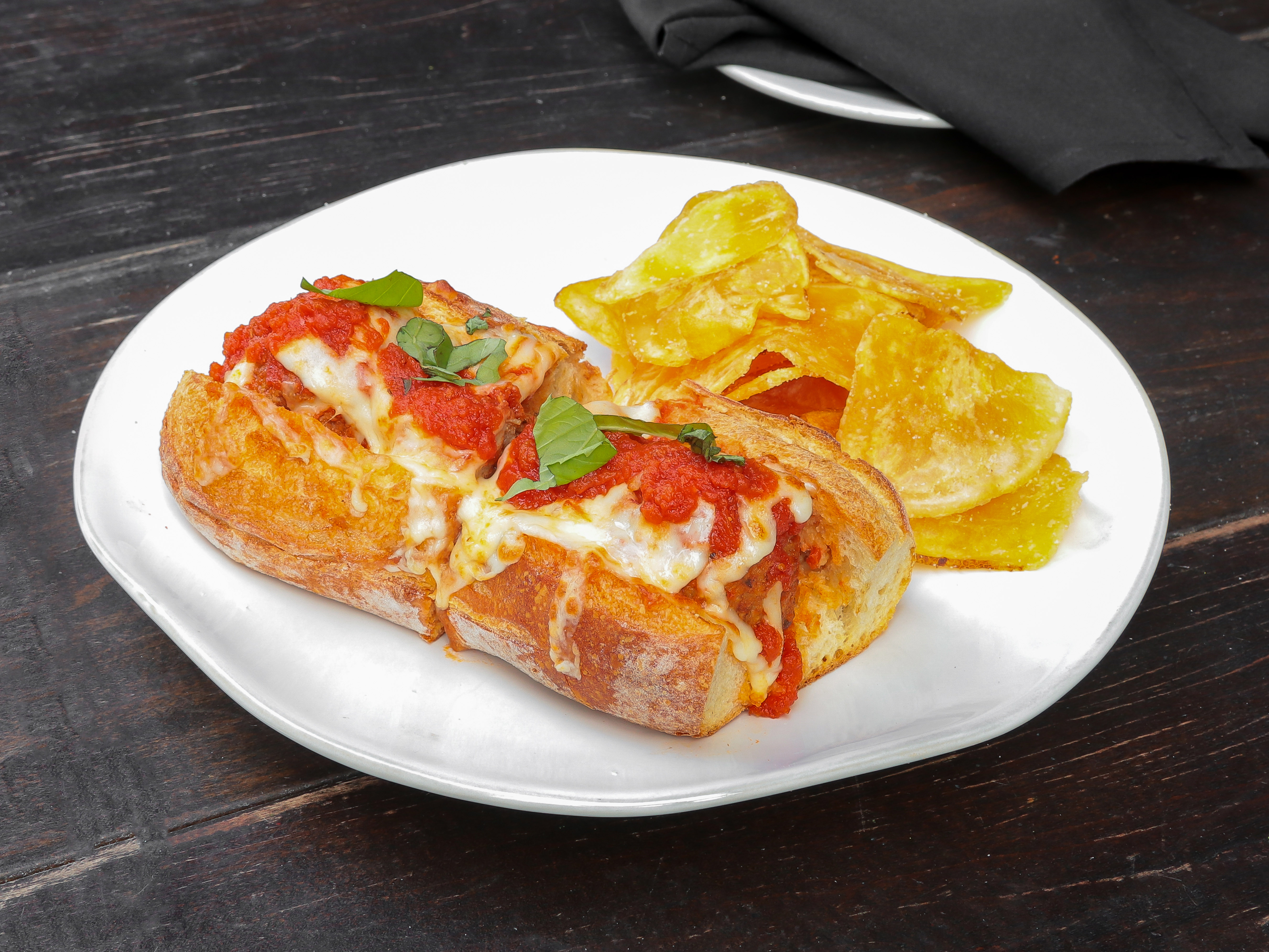 Order Meatball Parmigiana Sandwich food online from Stokes Pub store, Janesville on bringmethat.com