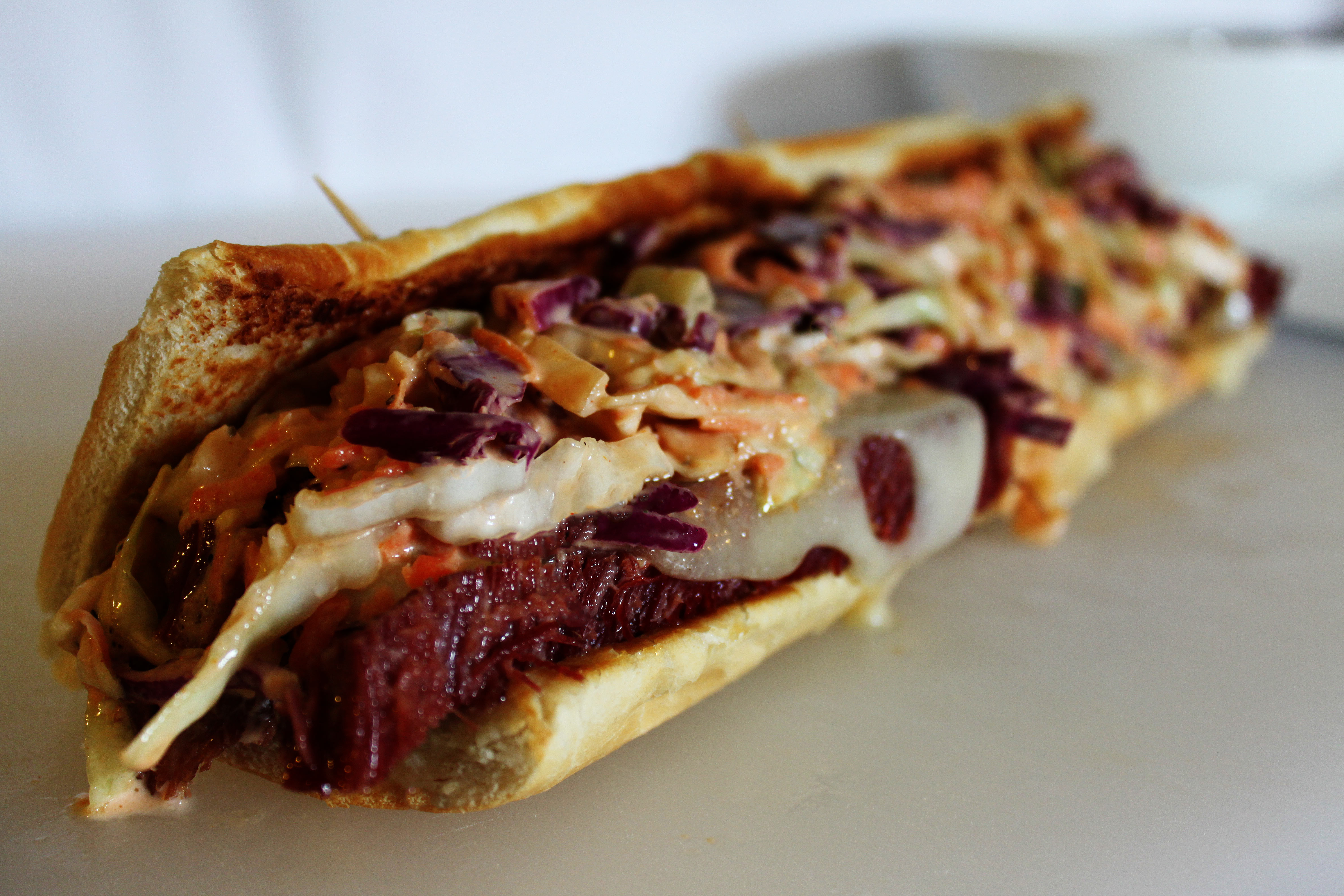 Order Reuben Sandwich food online from Anthony Deli store, White Plains on bringmethat.com