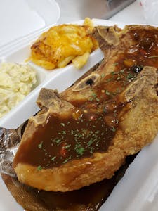 Order Pork Chop Smothered or Fried (Meal) food online from Rhapsody store, Fresno on bringmethat.com