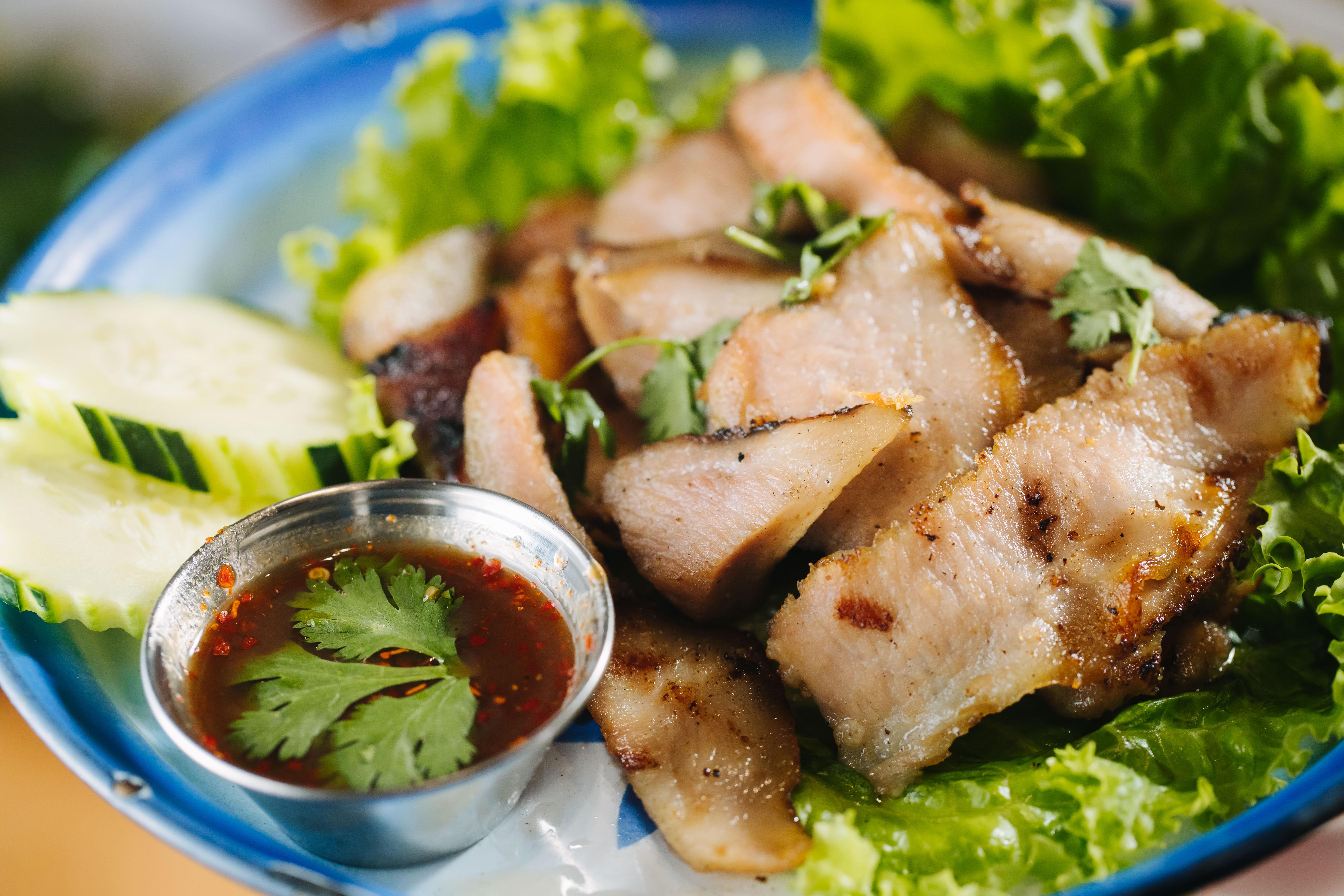 Order G9-Kor Moo Yaang food online from Too Thai Street Eats store, Carrollton on bringmethat.com