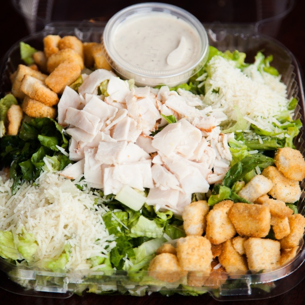 Order Caesar Salad food online from Sunset Deli store, West Hollywood on bringmethat.com