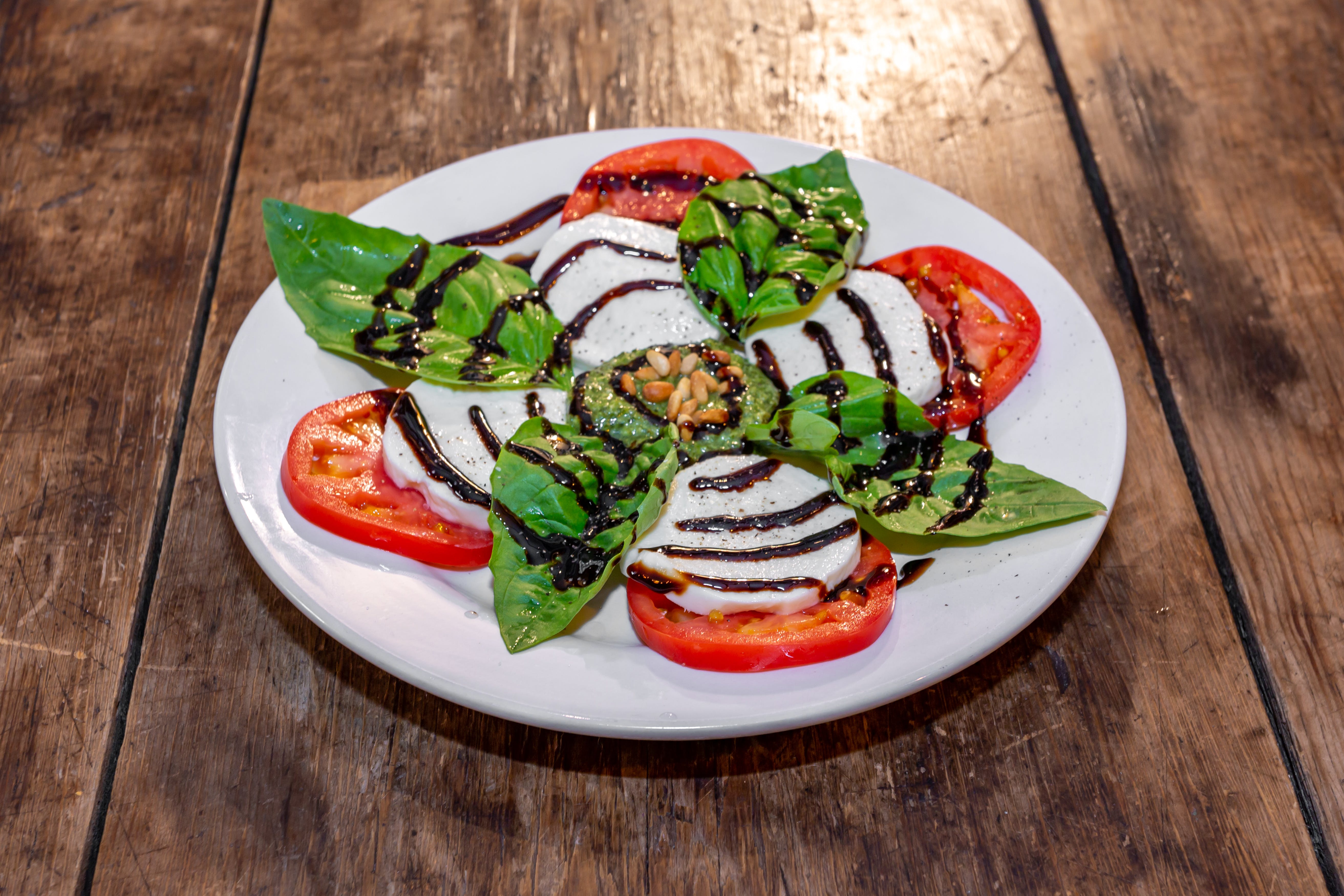 Order Caprese - Appetizers food online from Cafe Galleria store, Midway on bringmethat.com