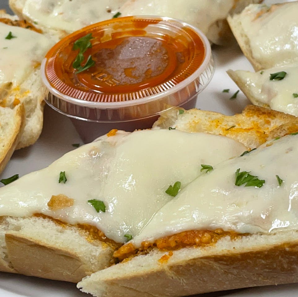 Order Garlic Bread with Cheese - Appetizer food online from Davila's Pizza & Restaurant store, Hackettstown on bringmethat.com