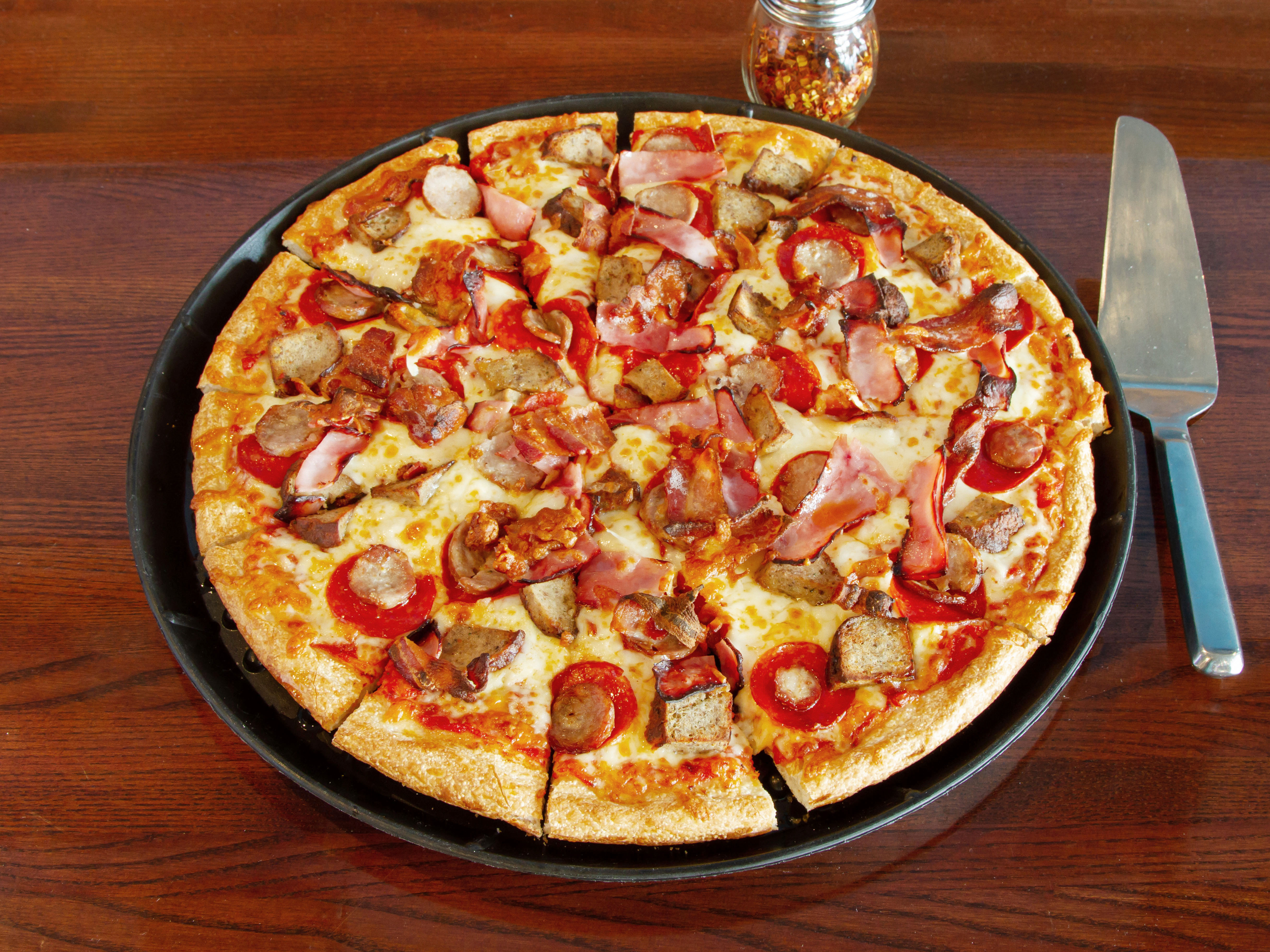 Order Meat Lovers Pizza food online from Zorba Pizza & Pub store, North Providence on bringmethat.com