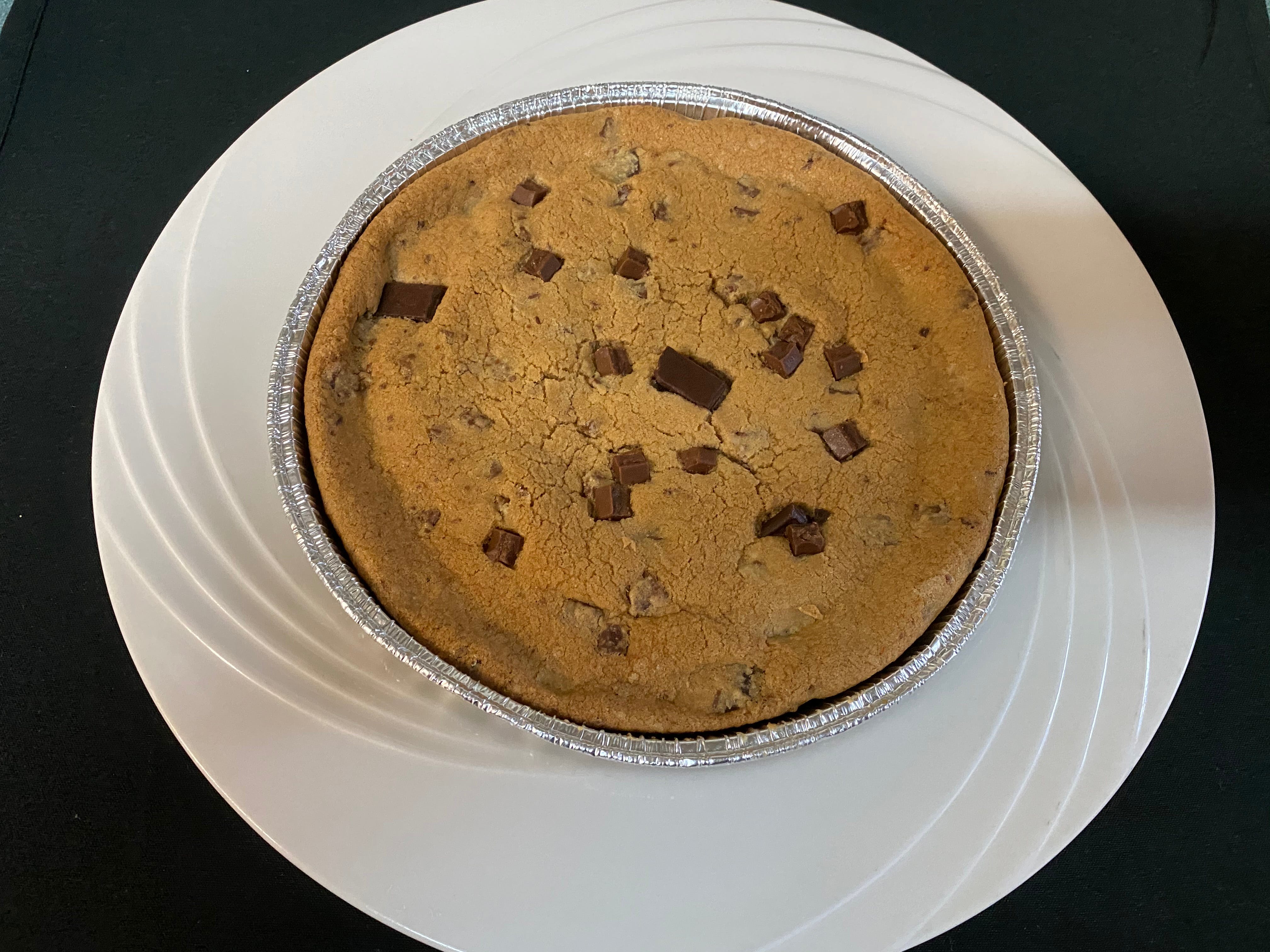 Order Deep Dish Chocolate Chip Cookie - 8" food online from Tullia store, West Berlin on bringmethat.com