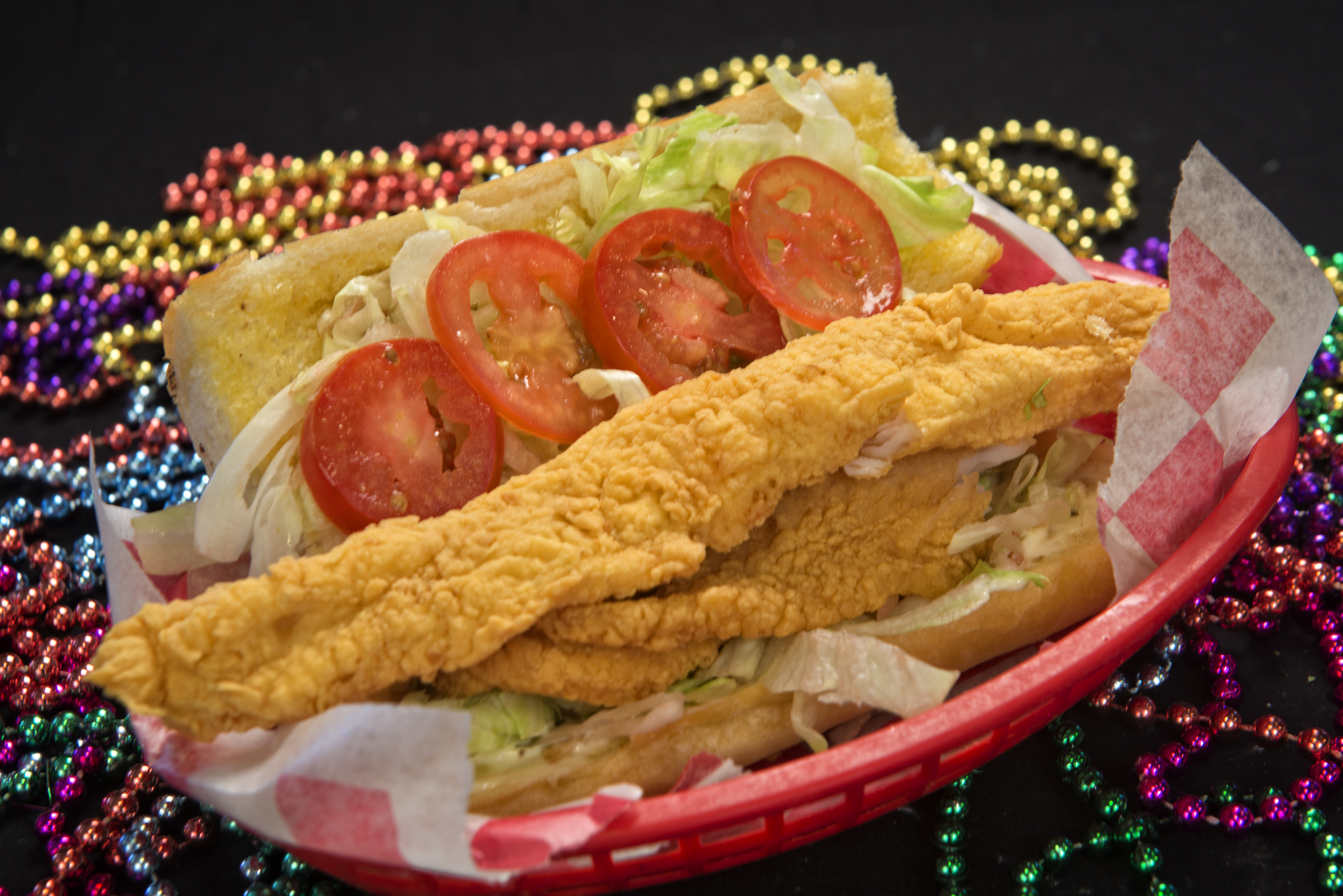 Order Fried Catfish Po' Boy food online from The Lost Cajun store, Fort Collins on bringmethat.com