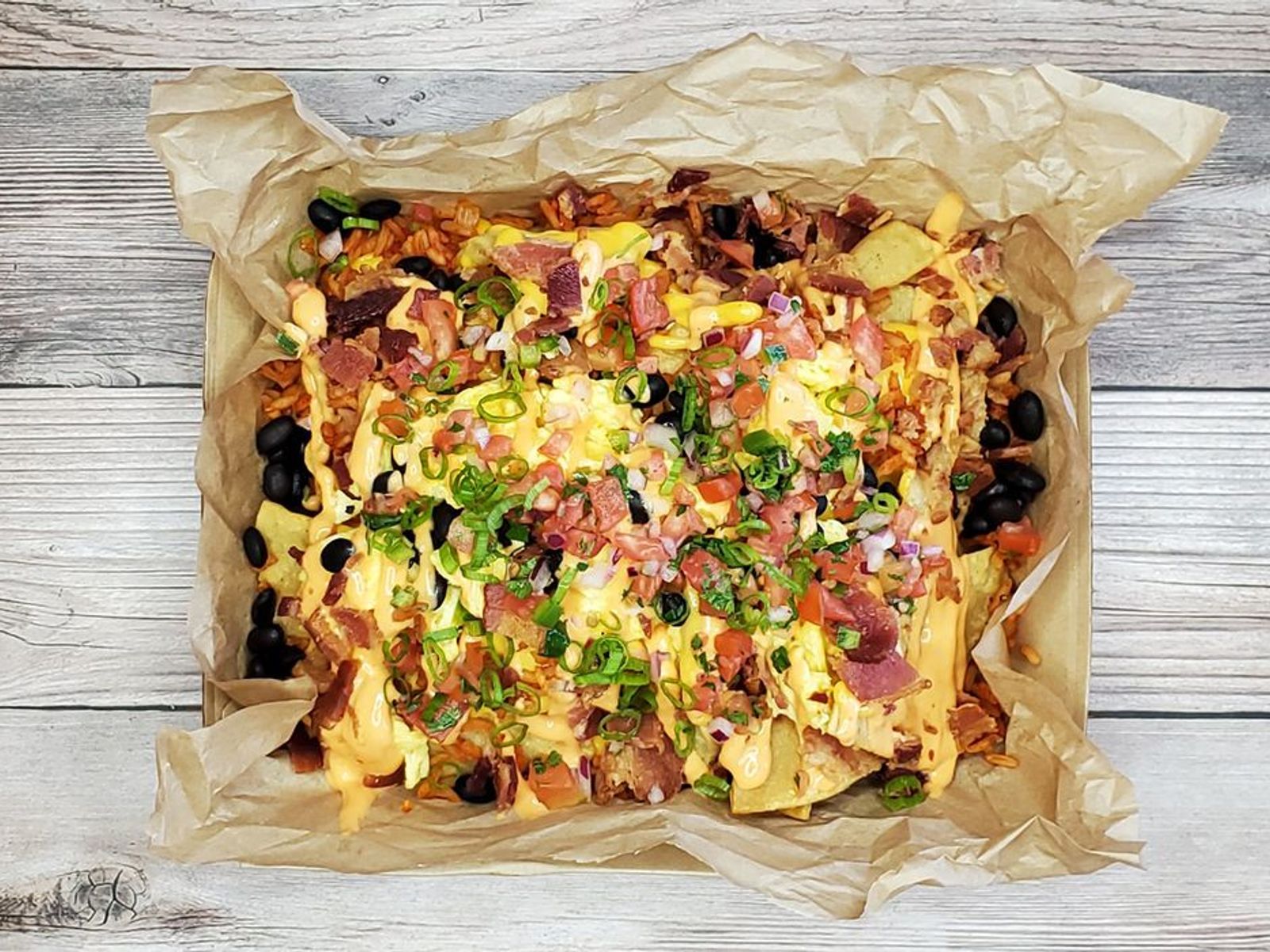 Order The Brinner Breakfast Nachos food online from Seaside Burritos and Tacos store, Culver City on bringmethat.com