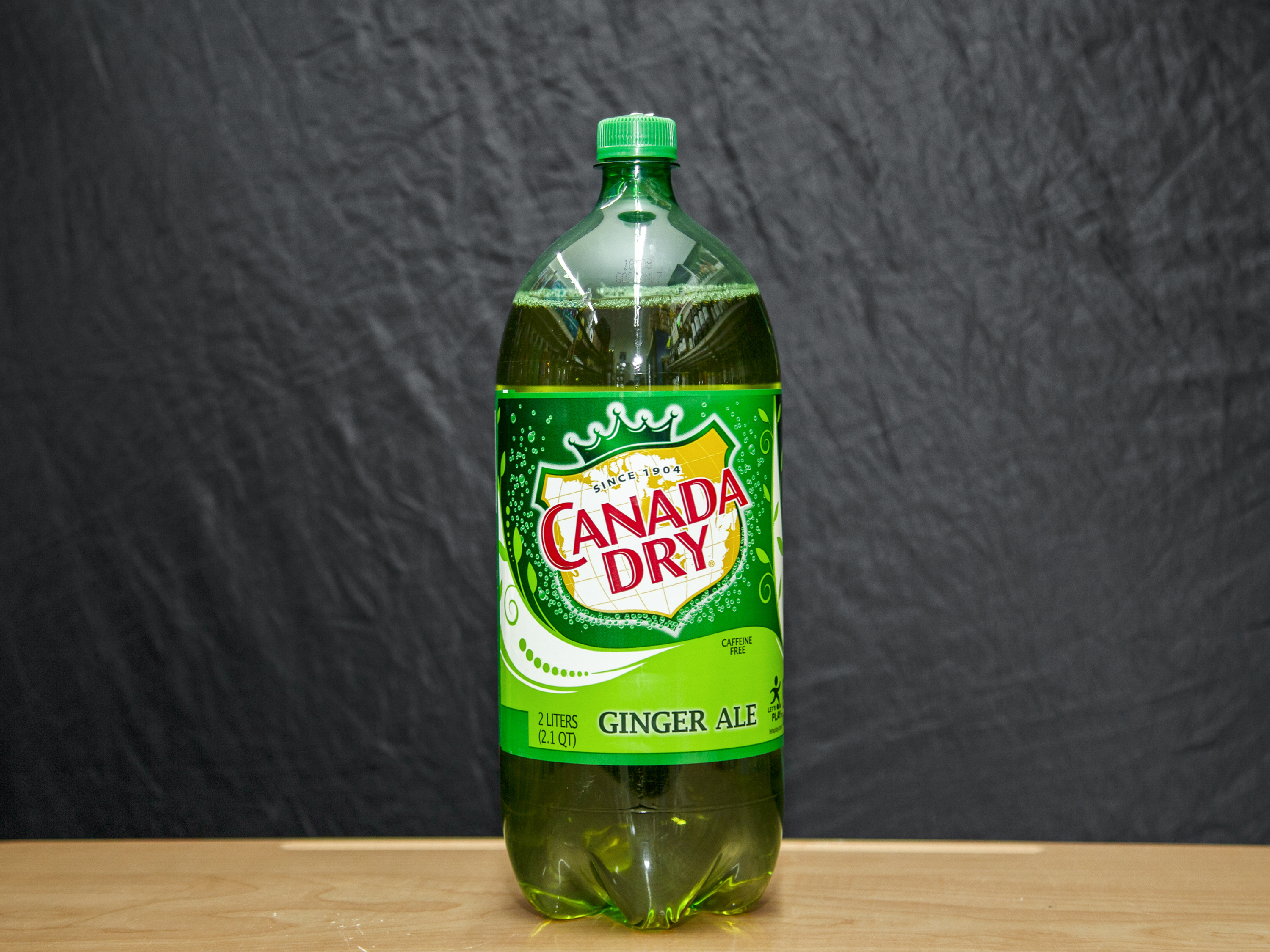 Order Canada Dry Ginger Ale, 2 Liter mixer food online from Platinum Star Food & Liquor store, Chicago on bringmethat.com
