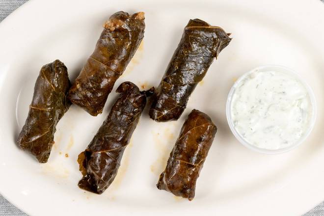 Order Grape Leaves (4 pcs) food online from Sahara Restaurant store, Indianapolis on bringmethat.com