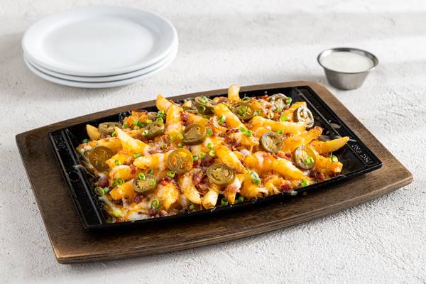 Order Texas Cheese Fries - Full food online from Chilis Grill & Bar store, Escondido on bringmethat.com