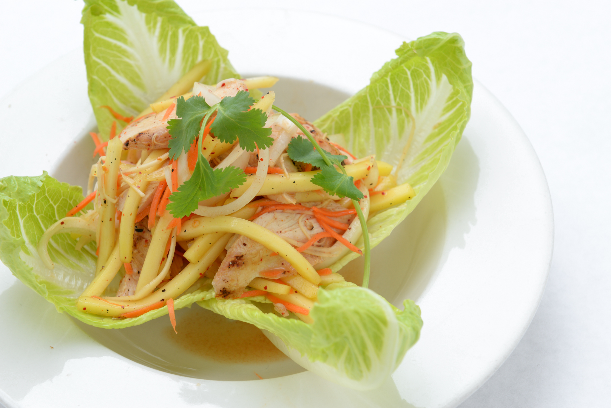 Order Yum Kai Mango Salad food online from Bangkok West Thai store, Santa Monica on bringmethat.com