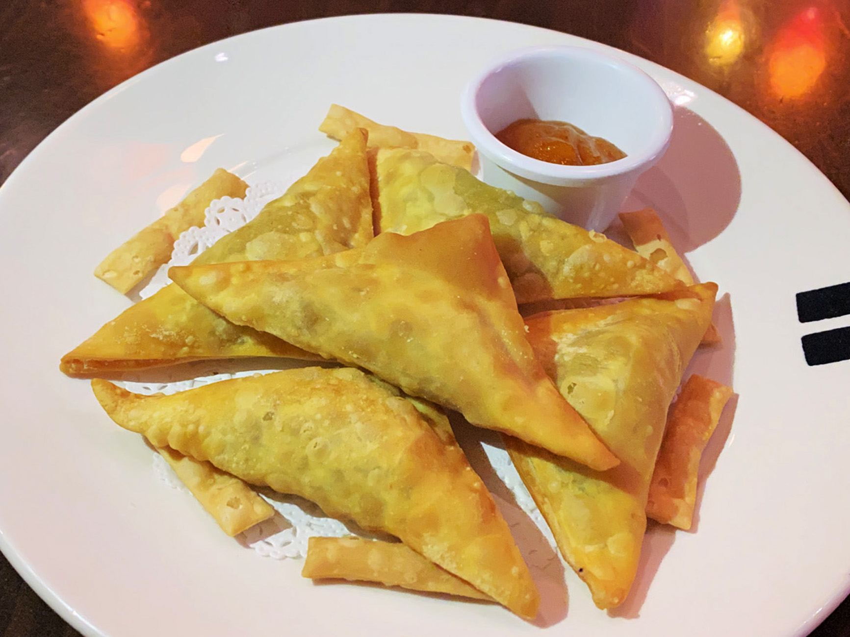 Order 5 Pieces Crispy Spicy Vegetable Samosas food online from Potstickers Asian Grill + Sushi store, Newark on bringmethat.com